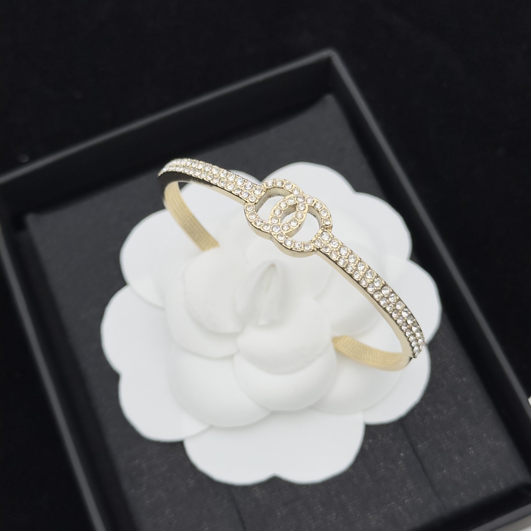 Gold-Tone Crystal-Encrusted Open Cuff Bracelet (Interlocking Motif)