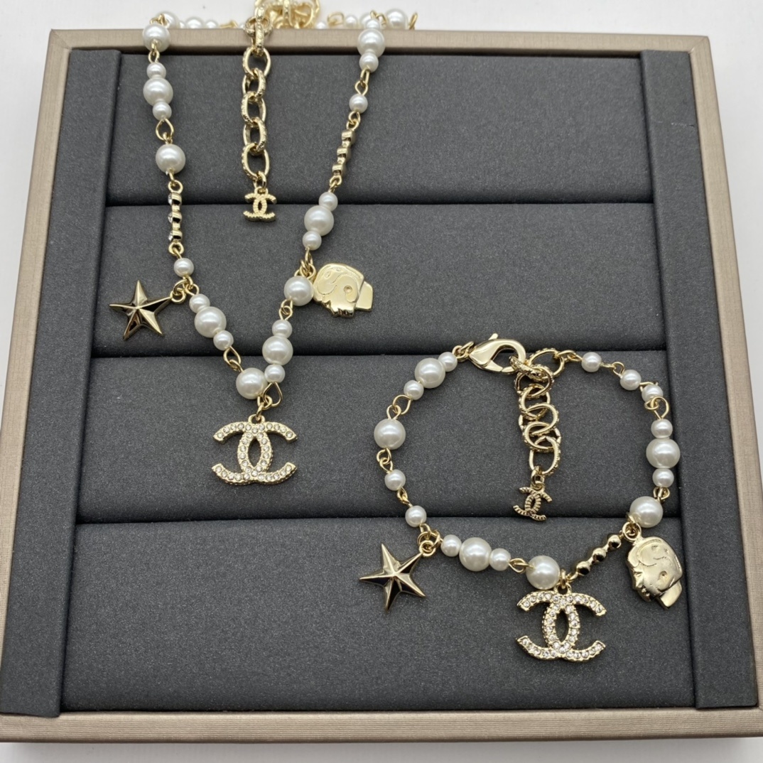 Gold-Toned Pearl & Whimsical Charm Jewelry Set (Necklace, Bracelet)