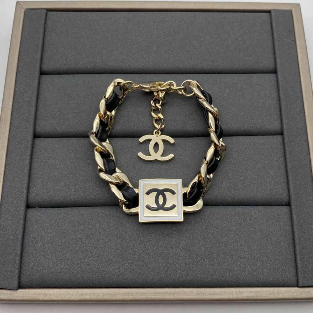 Jewelry Set with Leather, Enamel, and Interlocking Detail Accents in Gold and Black Tones