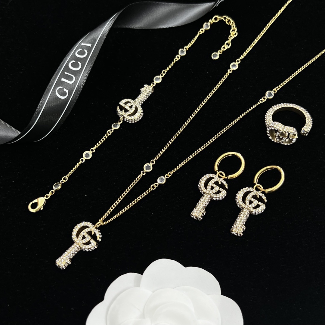 Gold-Tone Crystal Key & Link Jewelry Set: Necklace, Bracelet, Earrings & Open Ring