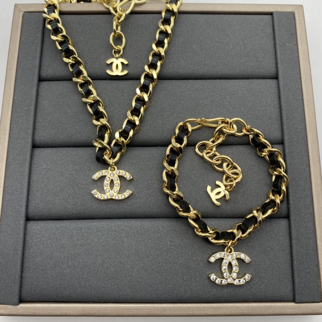 Jewelry Set with Black PU Leather, Crystal, and Interlocking Detail Accents in Gold Tones