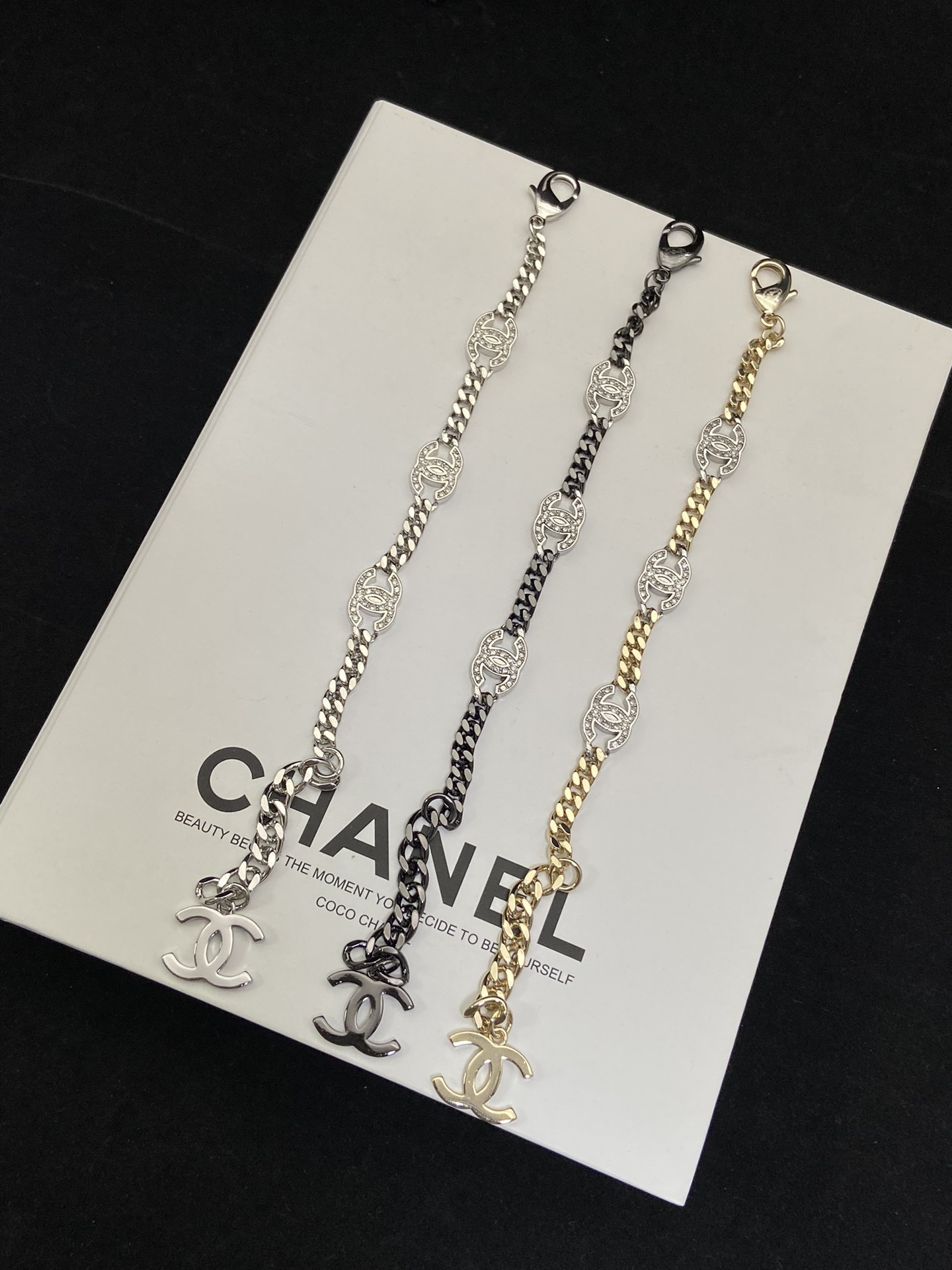 Tri-Tone (Gold, Silver, Black) Chain Jewelry Set with Crystal Interlocking Details