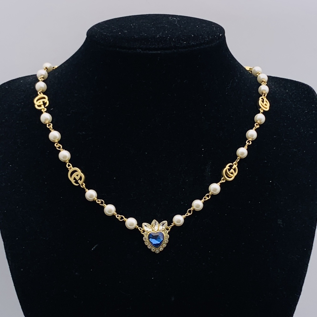 Gold-Tone Pearl & Blue Crystal Heart Jewelry Set: Necklace & Bracelet