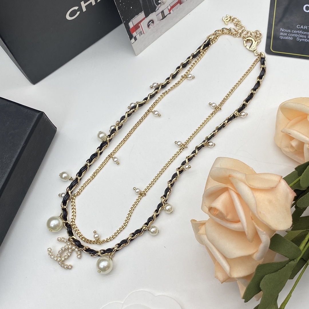 Jewelry Set with Double-Layered Black PU Leather, Pearl, Crystal, and Interlocking Detail Accents in Gold Tones