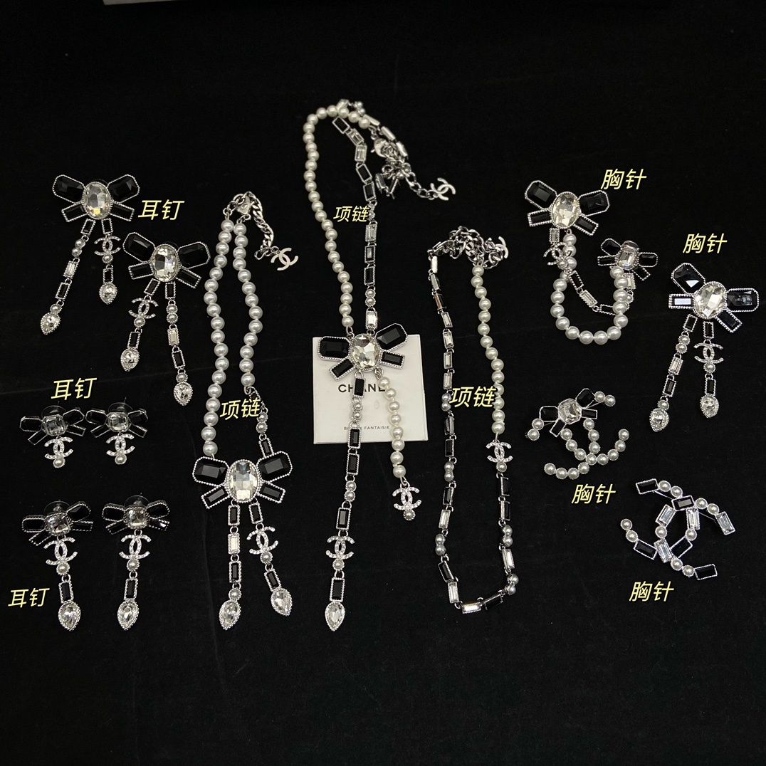 Silver-Toned Jewelry Set with Black Accent & Crystal Bow Motifs (2 Necklaces, 3 Earring Styles, 4 Brooches)