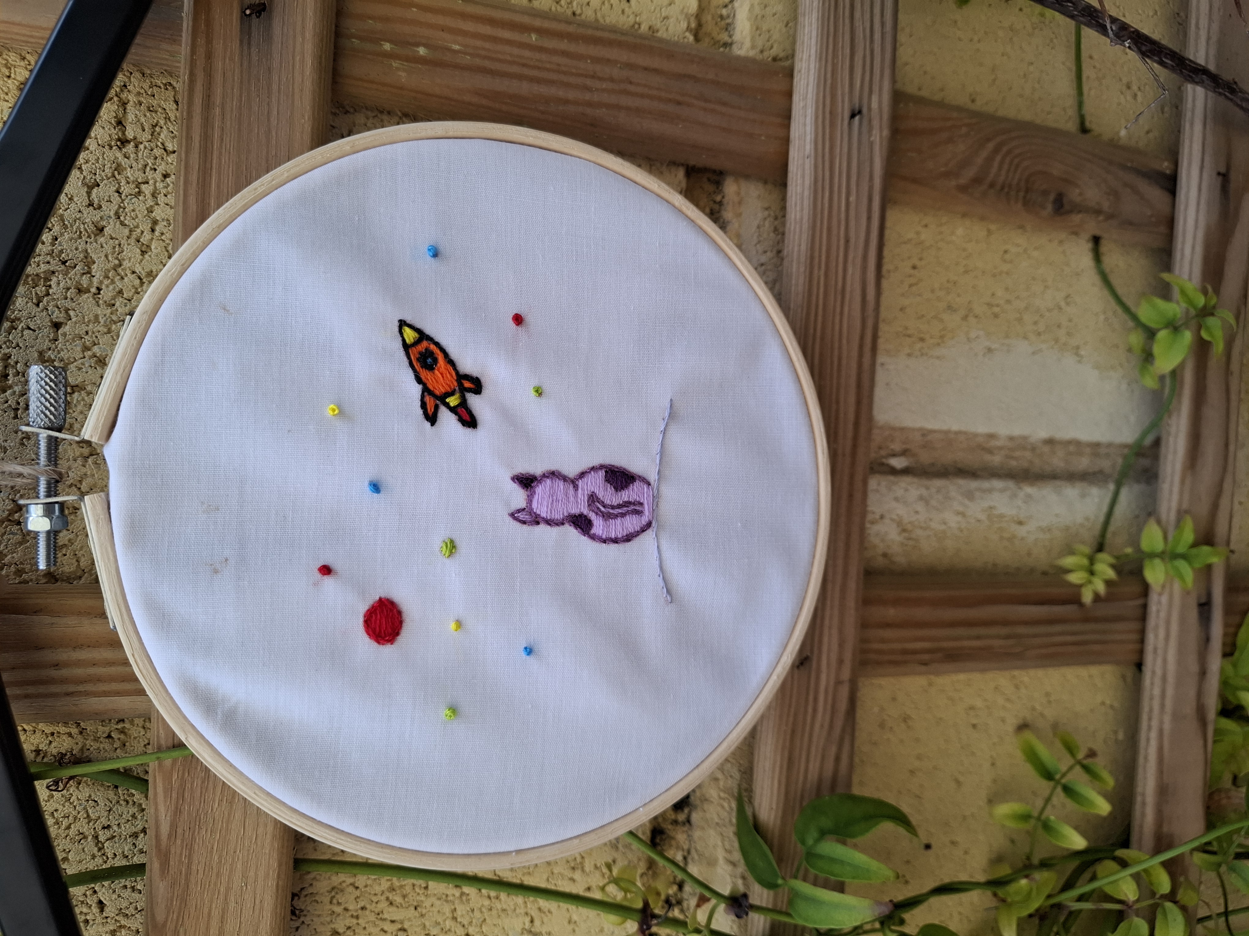 Hand-embroidered Cat and Rocket Hoop Art