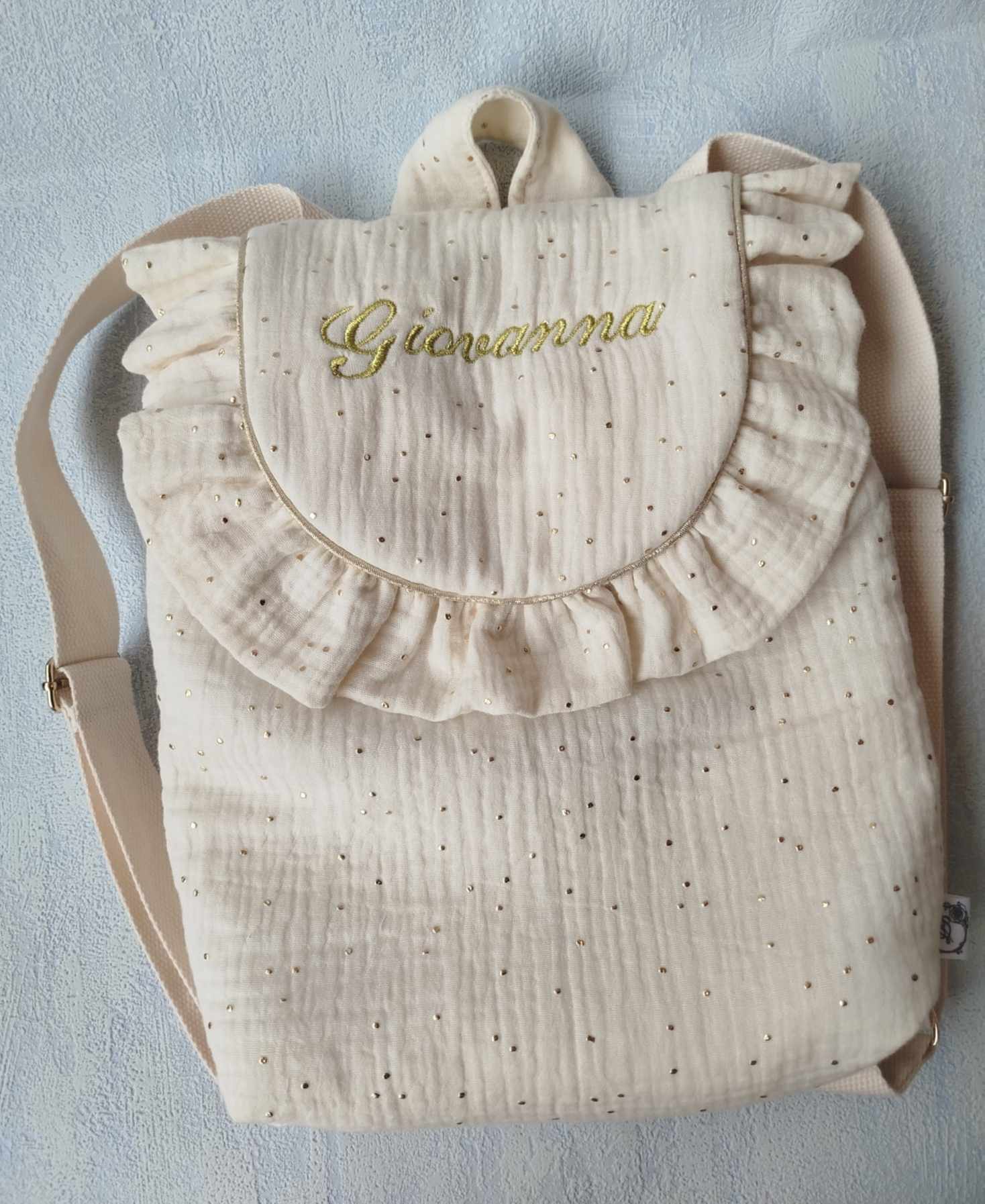 Sac à dos à volant écru a pois or