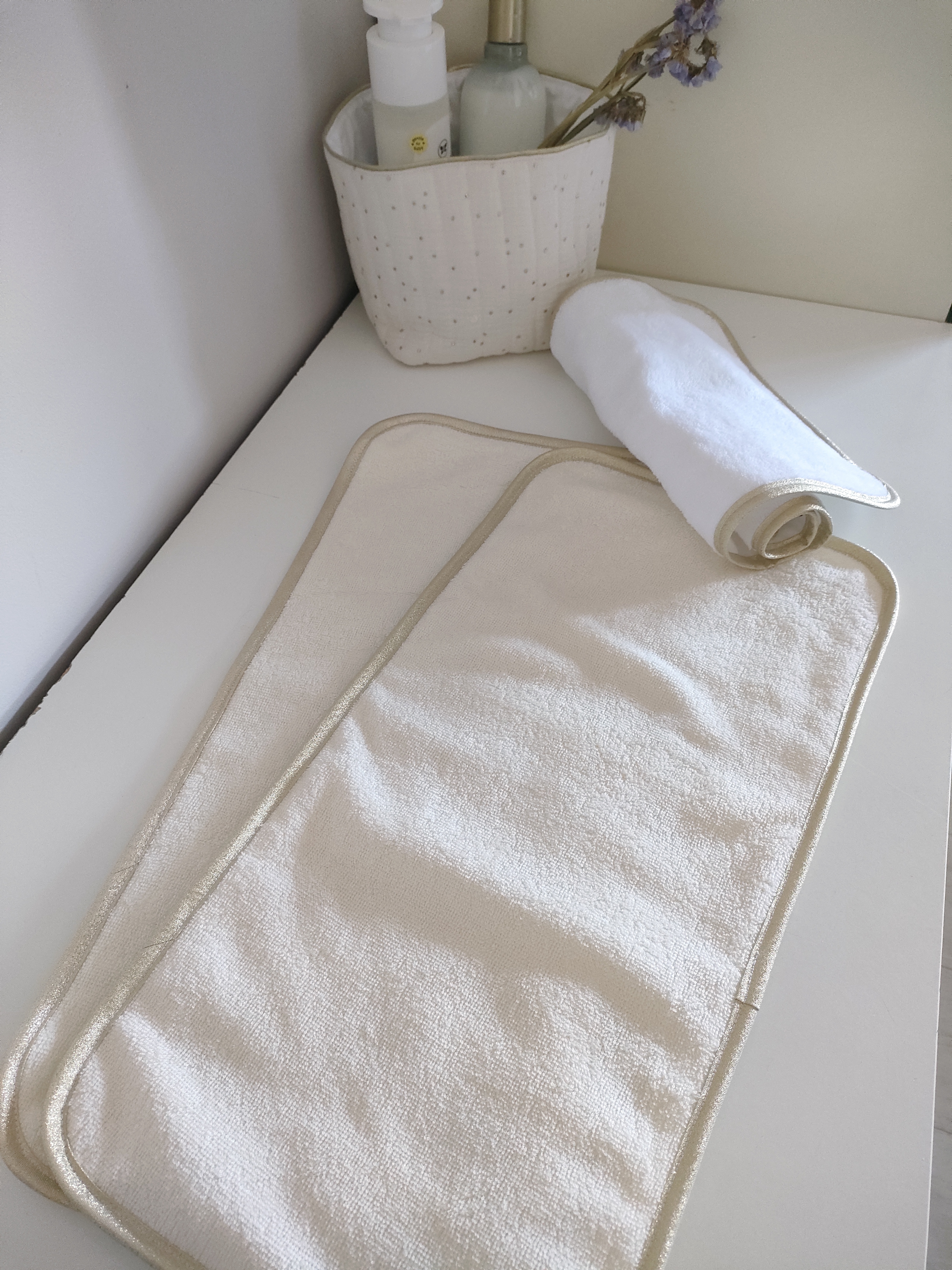 Serviette pour housse de matelas à langer