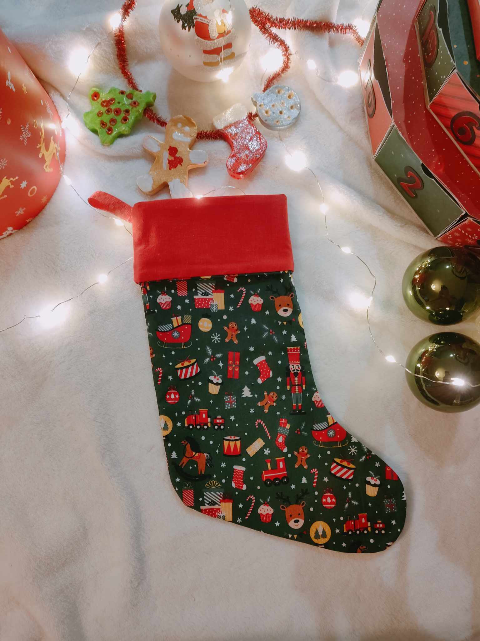 Chaussette de Noël verte avec Petits jouets