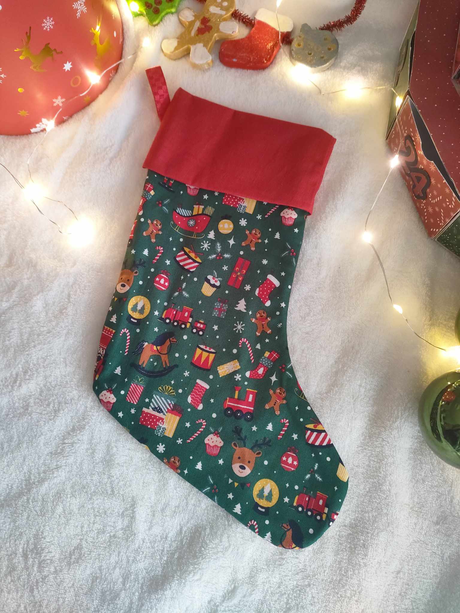 Chaussette de Noël verte avec Petits jouets