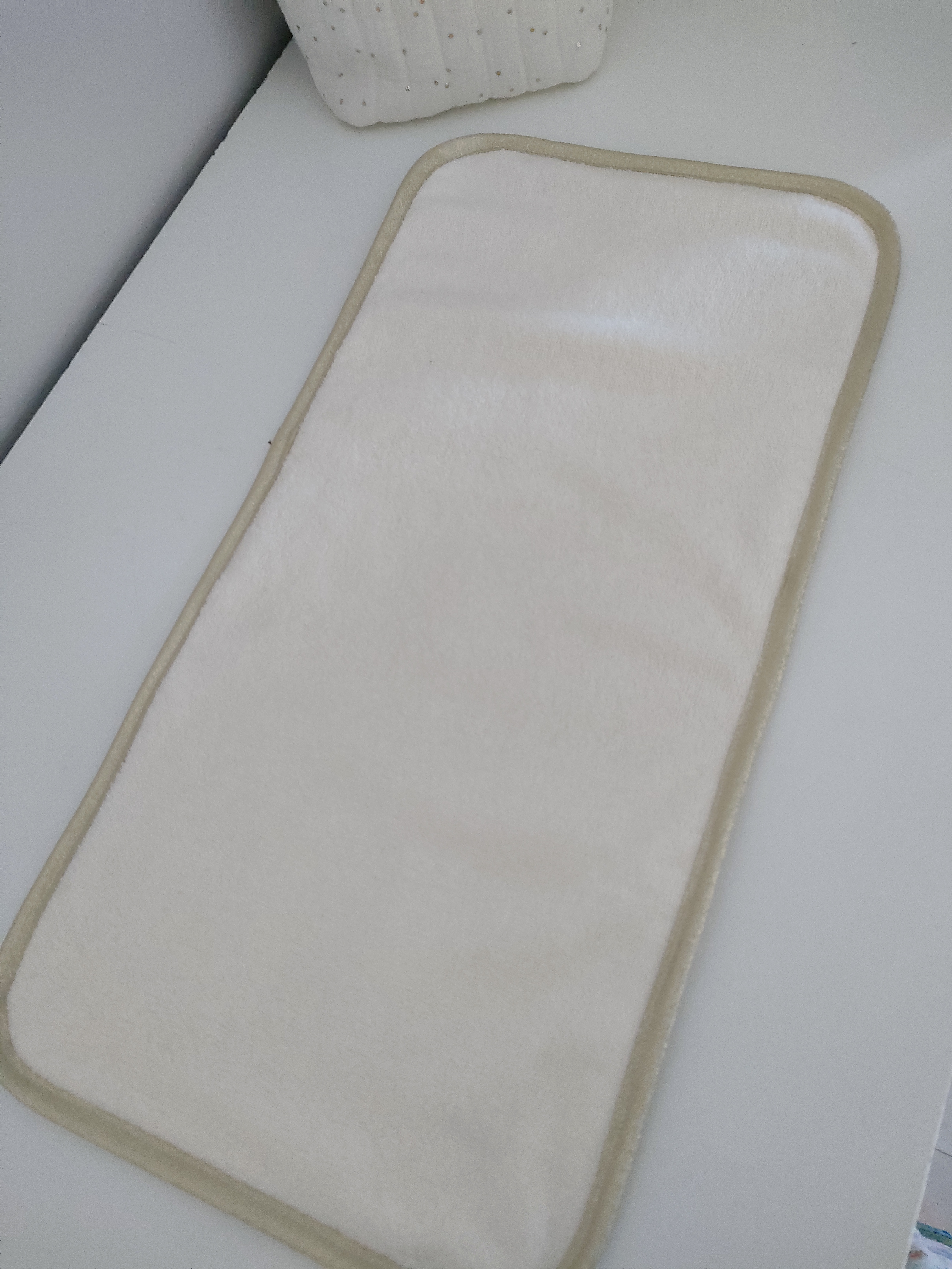 Serviette pour housse de matelas à langer