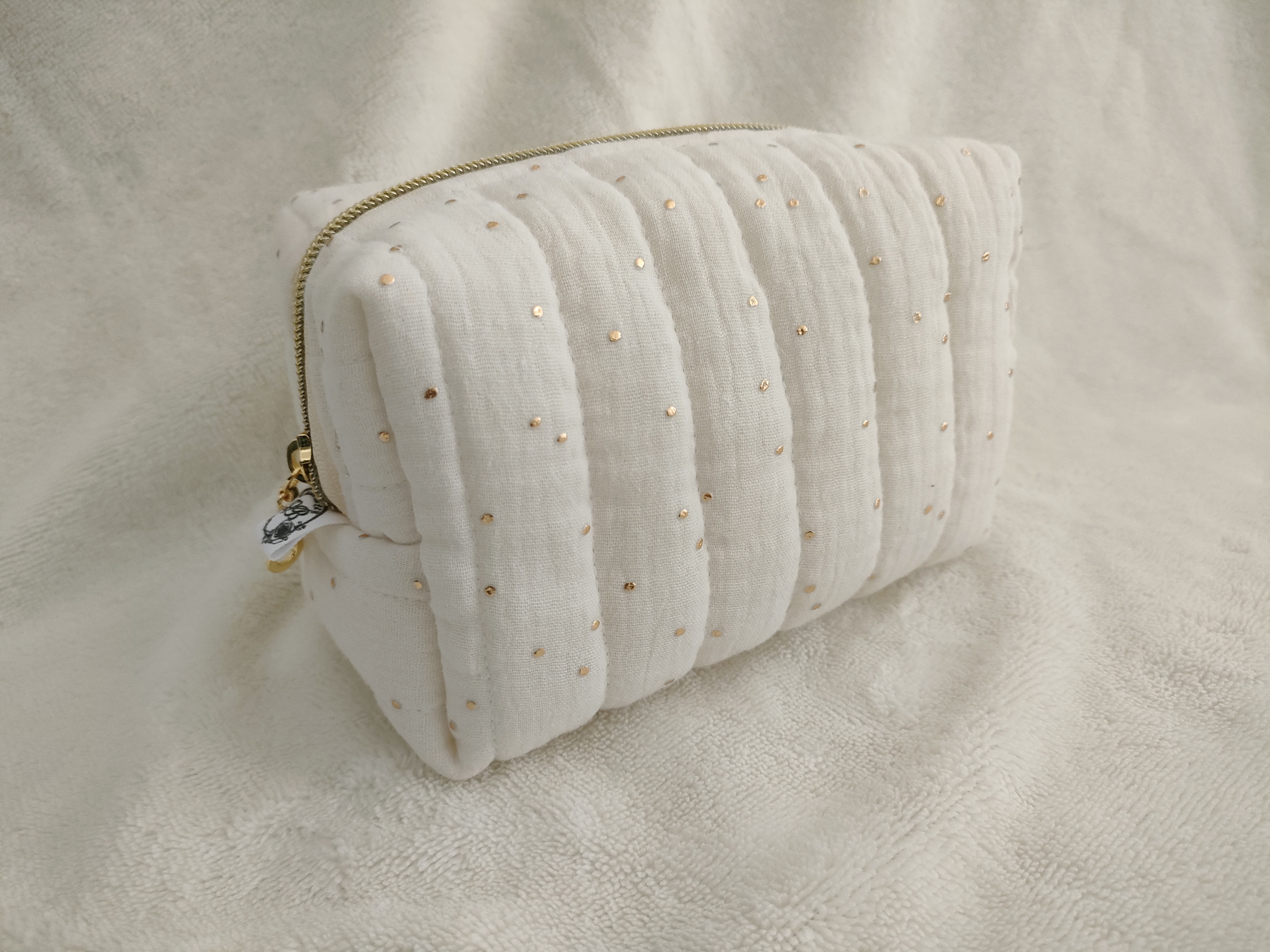 Trousse de toilette écru à pois or