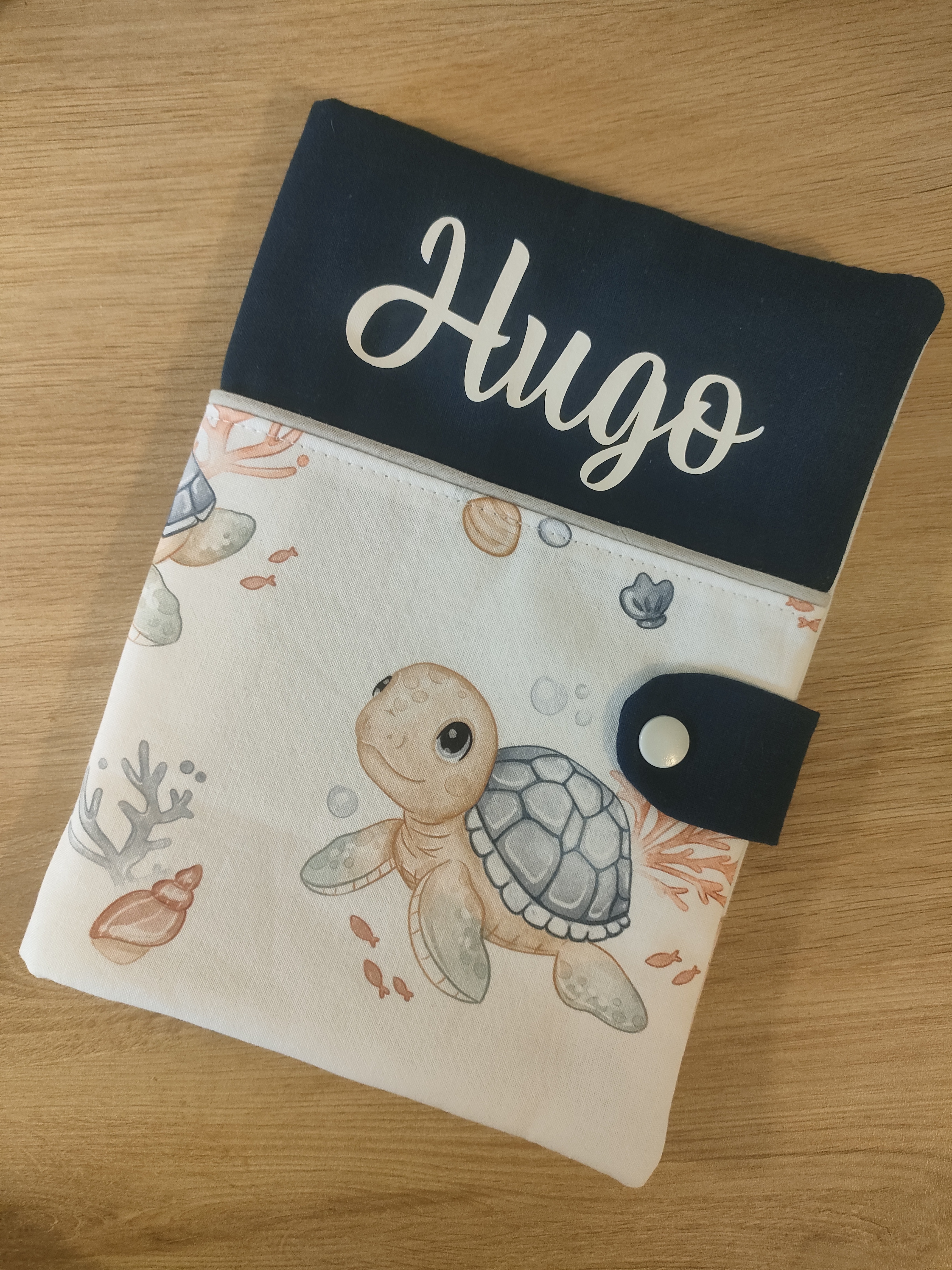 Protège carnet de santé tortue bleue