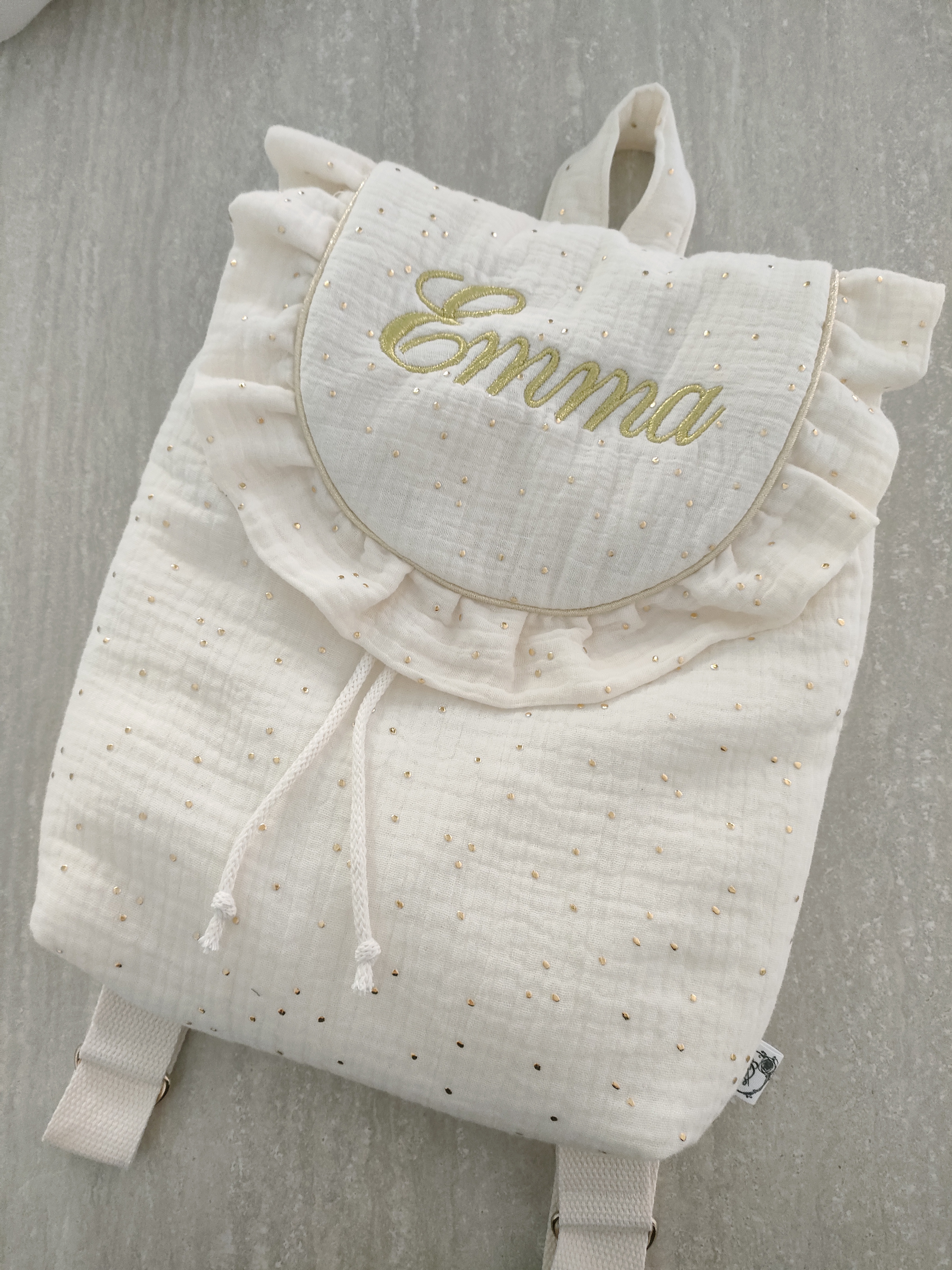 Sac à dos à volant écru a pois or