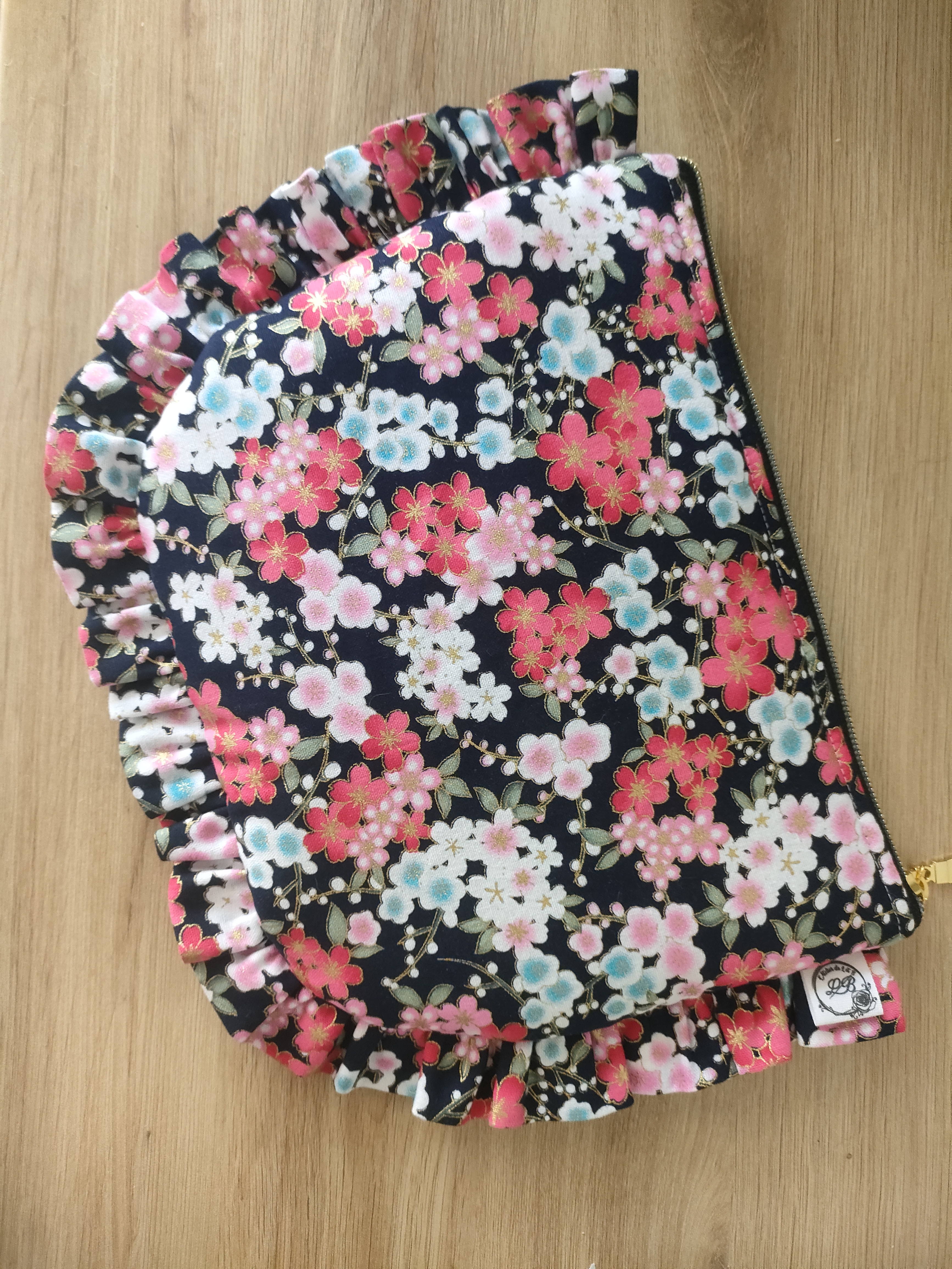 Pochette à volant fleur japonaise