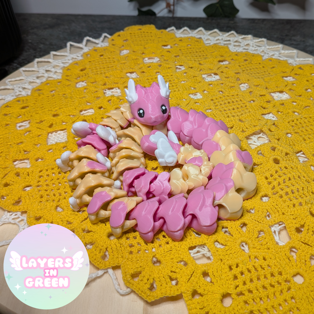 Cubid Dragon – Vaaleanpunainen pastelliloitsu