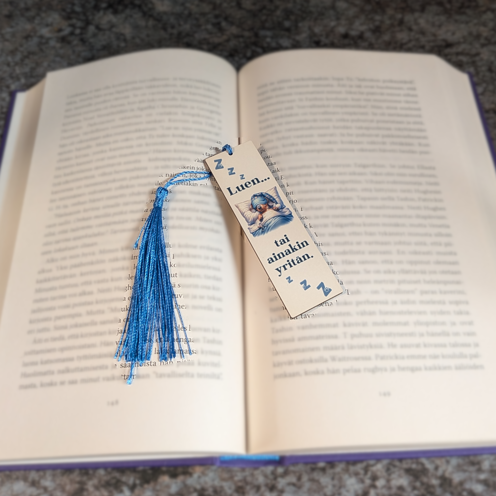 Luen... - kirjanmerkki koiralla tai kissalla