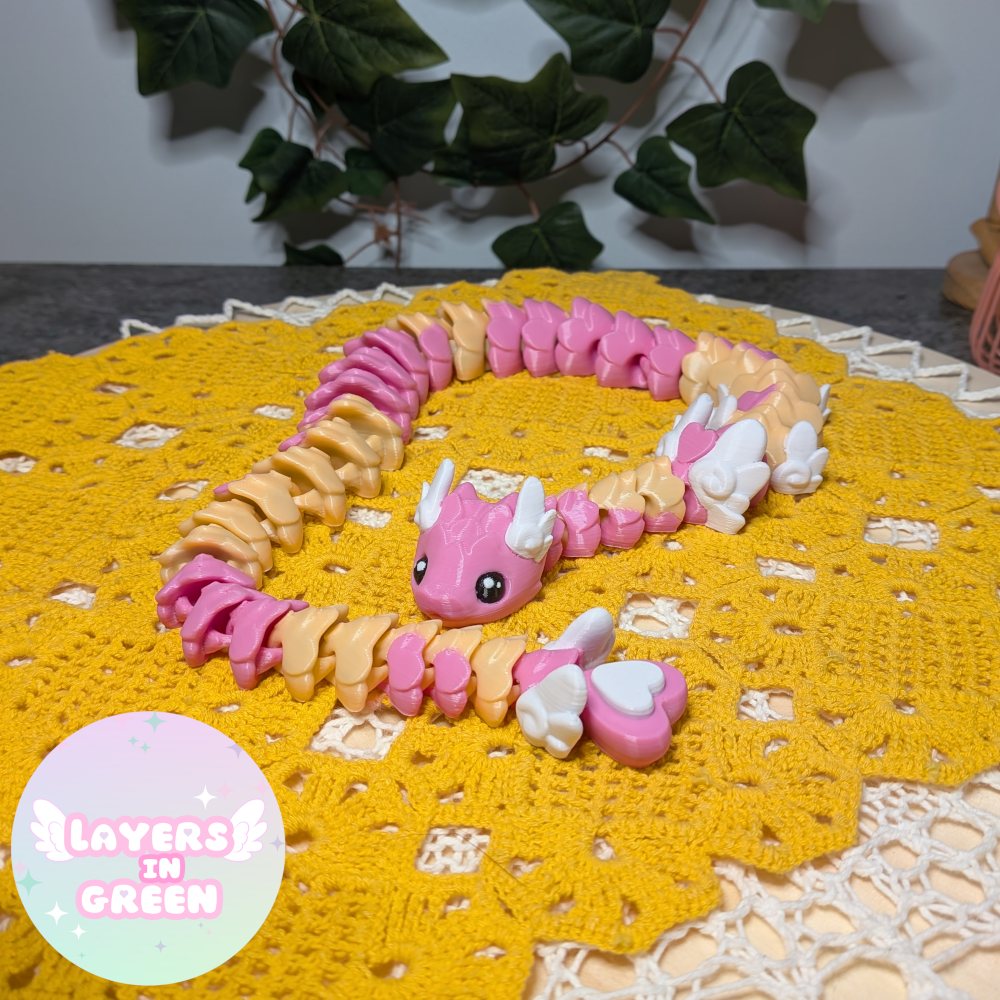 Cubid Dragon – Vaaleanpunainen pastelliloitsu