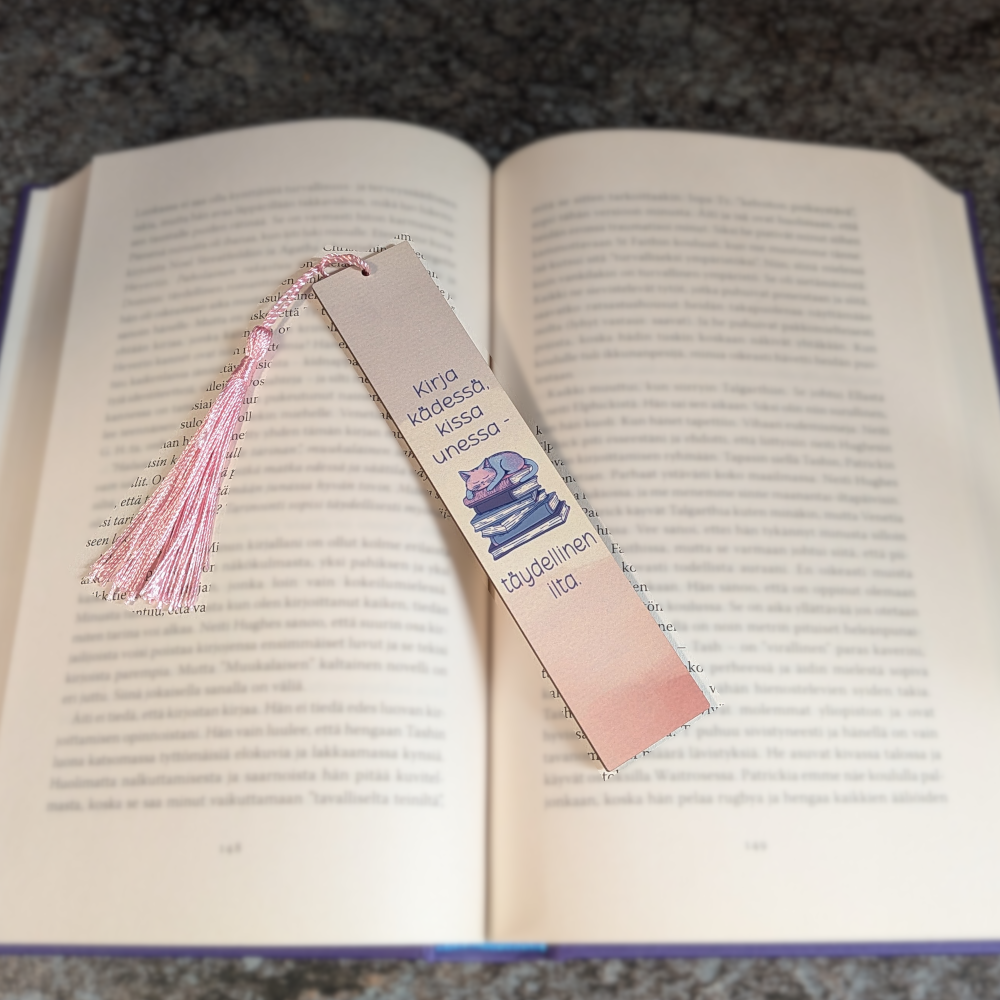 Kirja kädessä kissa unessa - kirjanmerkki