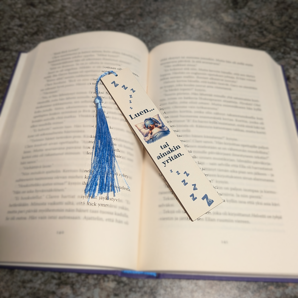 Luen... - kirjanmerkki koiralla tai kissalla