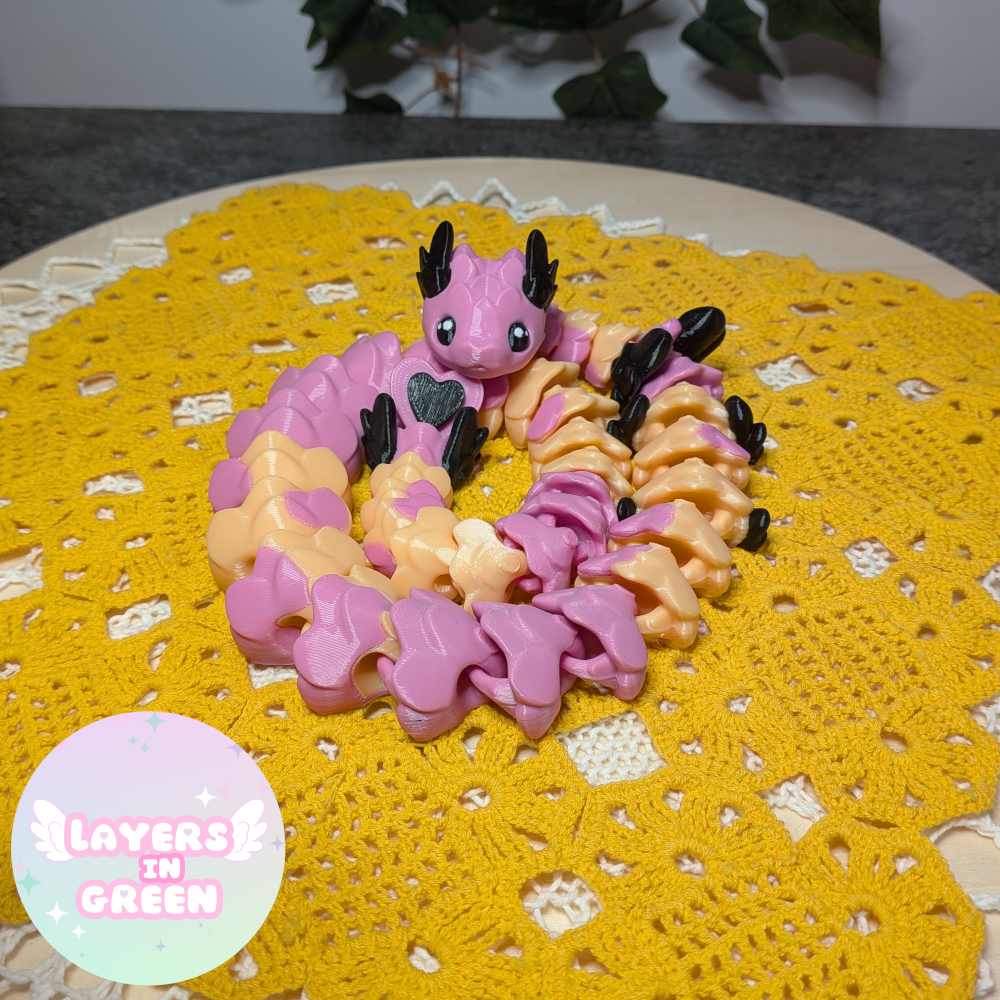 Cubid Dragon – Vaaleanpunainen pastelliloitsu