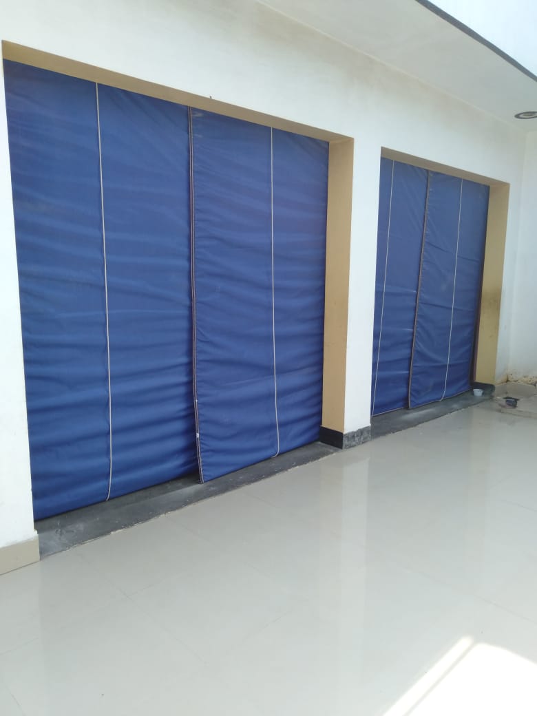 Blue Roll-Up Industrial Curtains