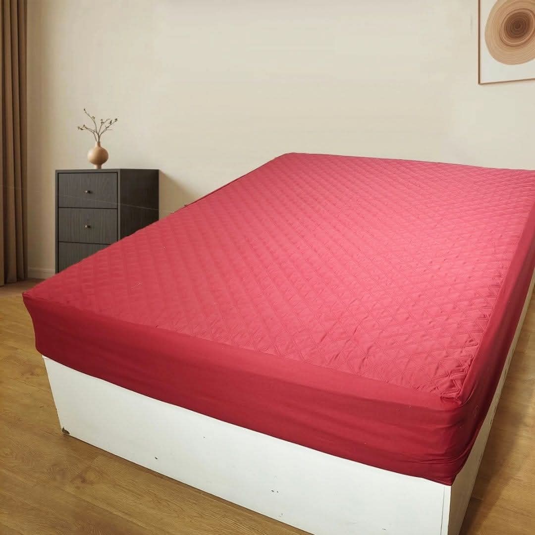 Protège-matelas rouge impermeable