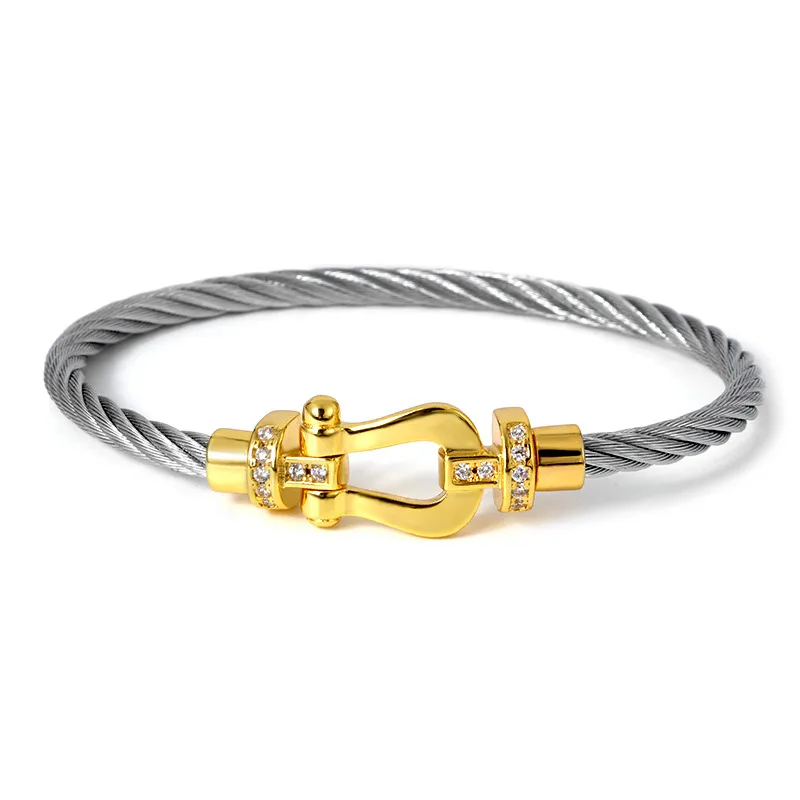 Bracelet câble acier inoxydable et fermoir doré