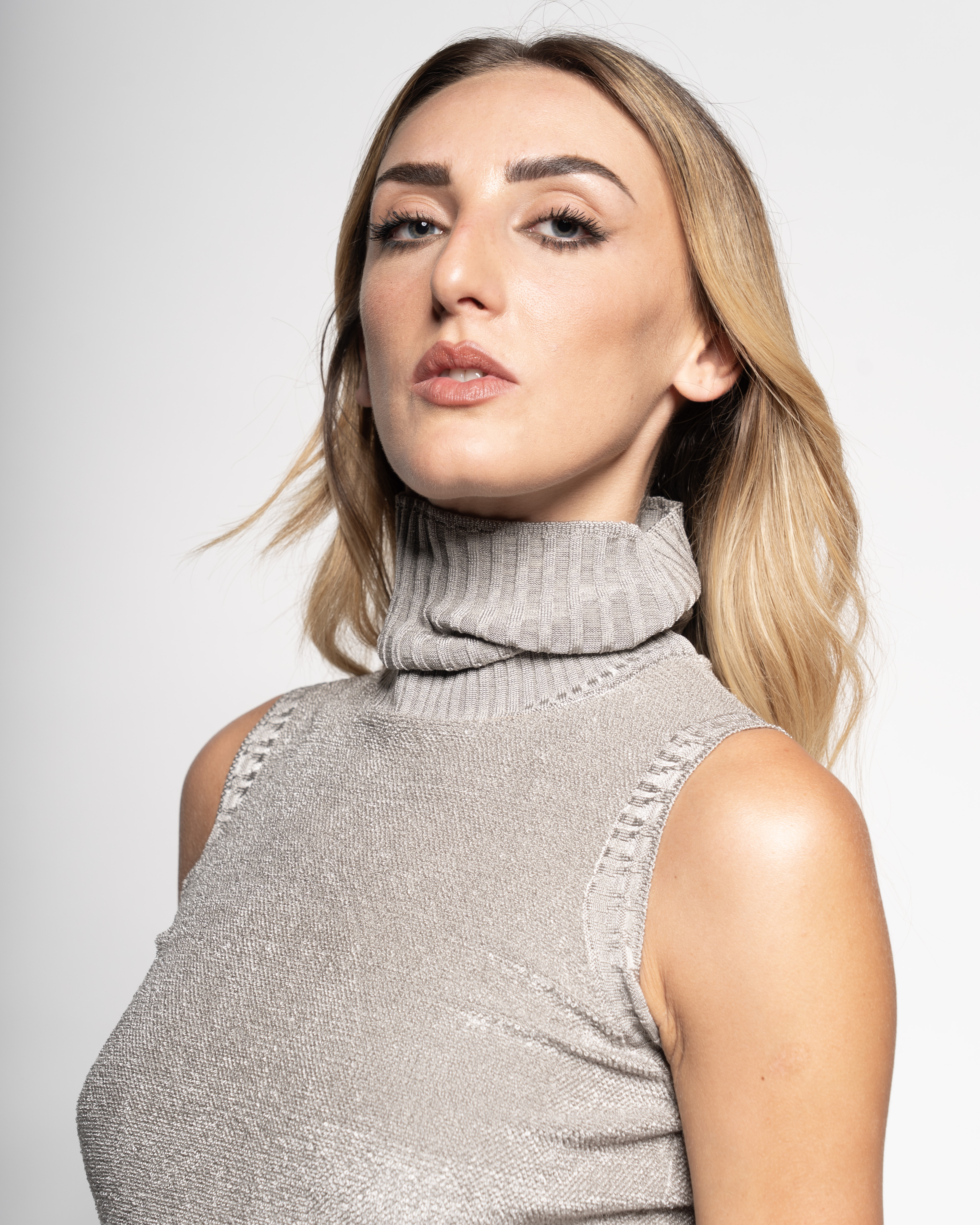 Fur-knit turtle-neck vest