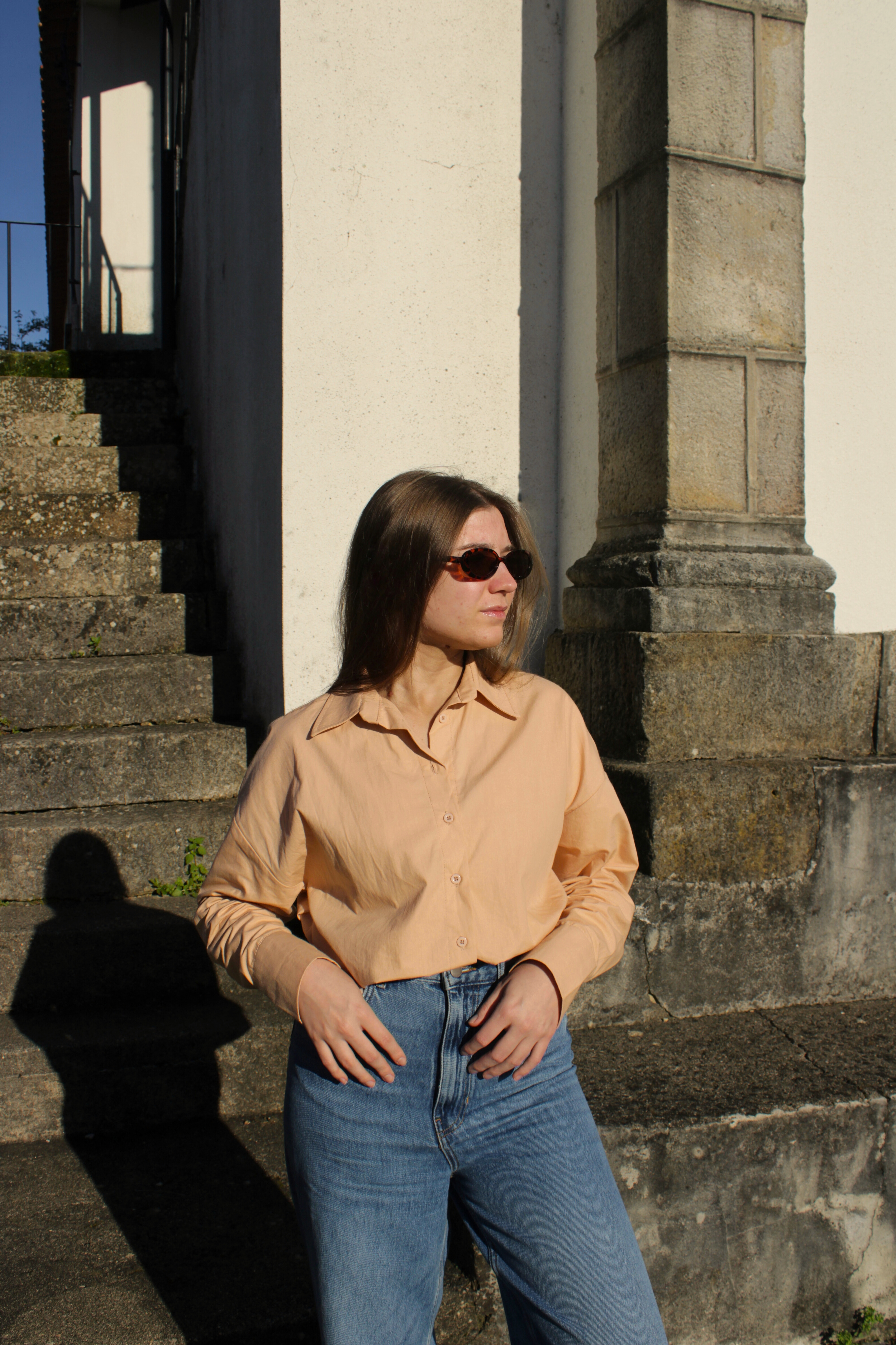 Oversized Peach Shirt: The Sophistication of Form and Movement
