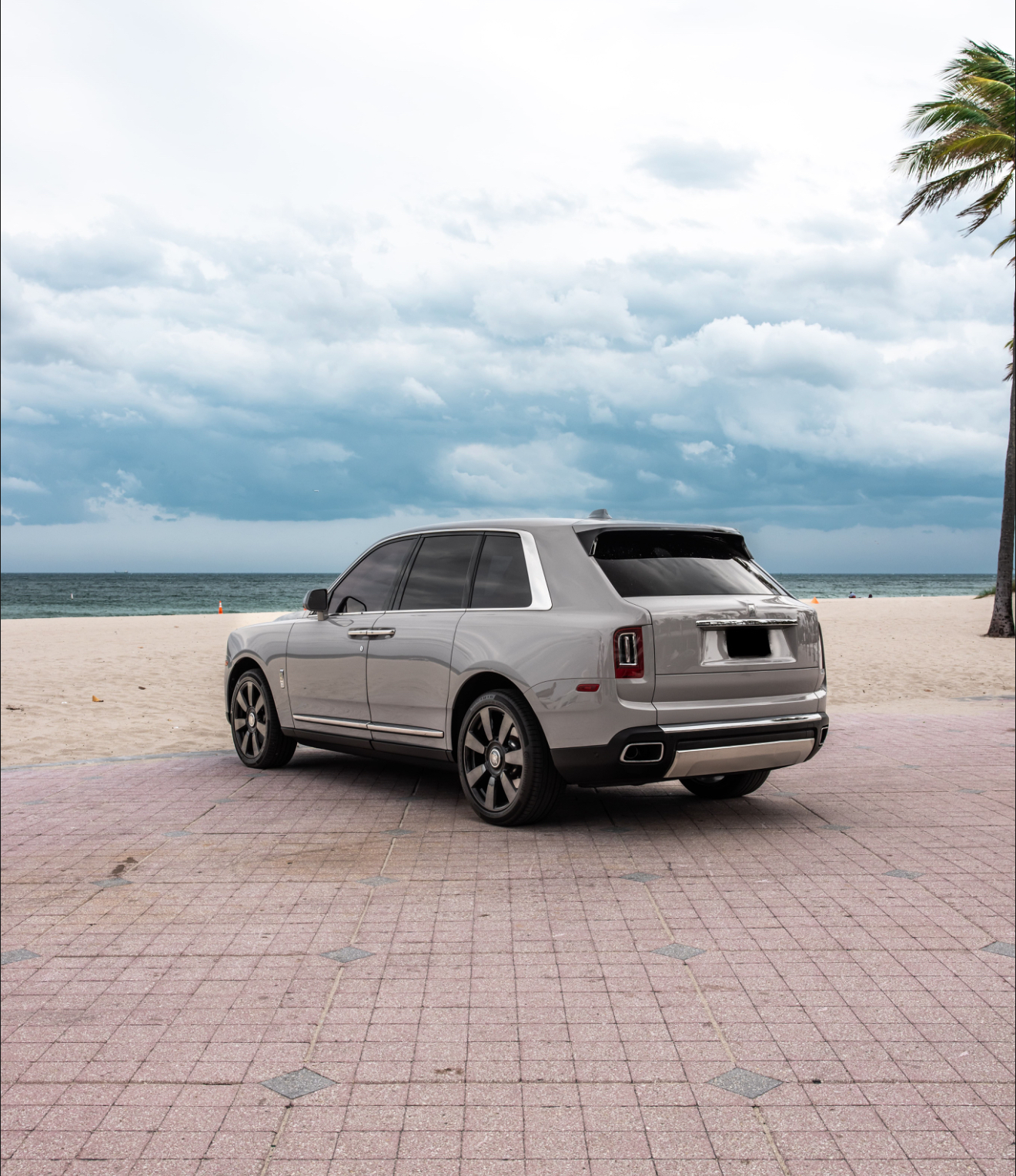 Chauffeur Service - Silver on Mandarin Rolls Royce Cullinan
