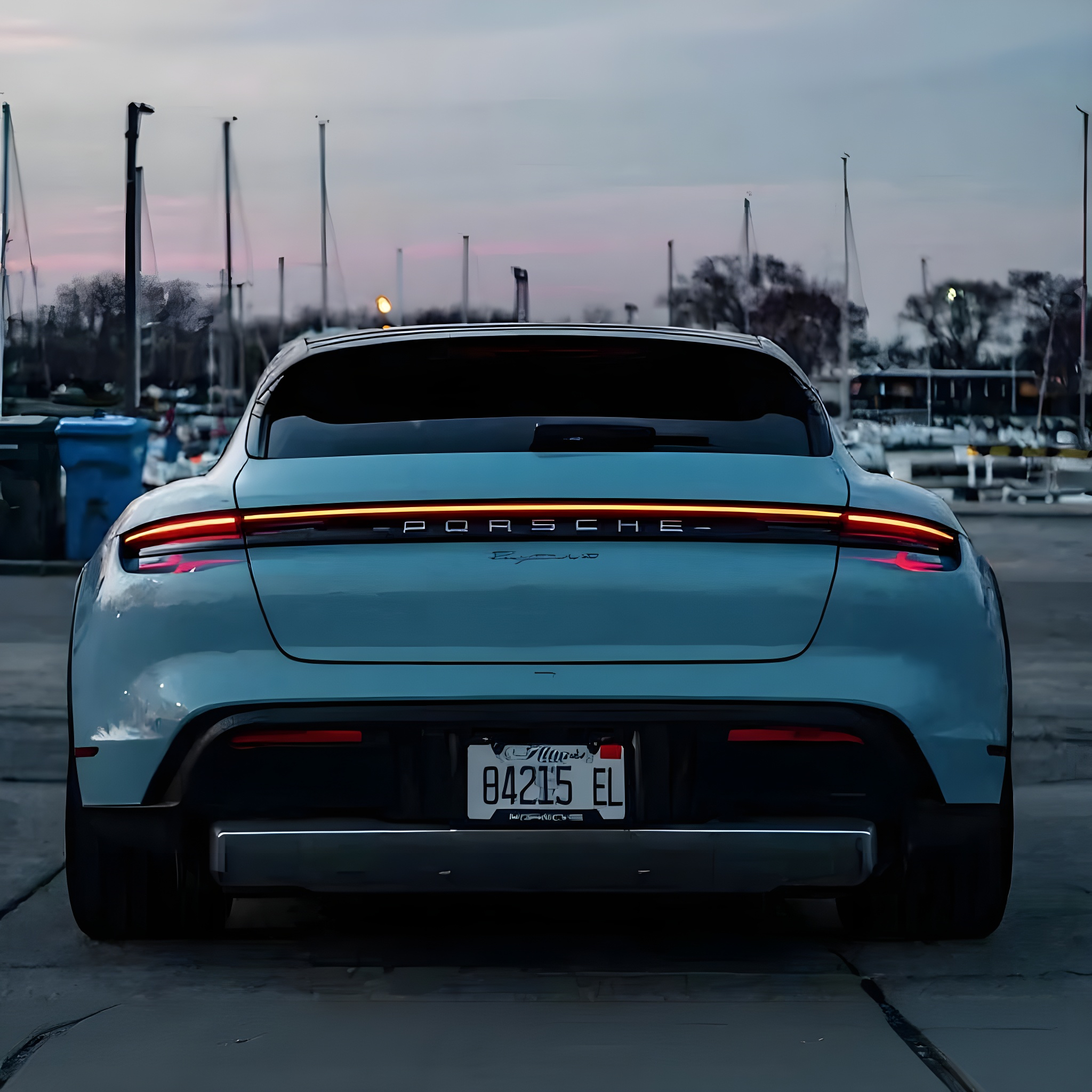 Porsche Taycan - Frozen Light Blue Metallic on Black & Truffle Brown