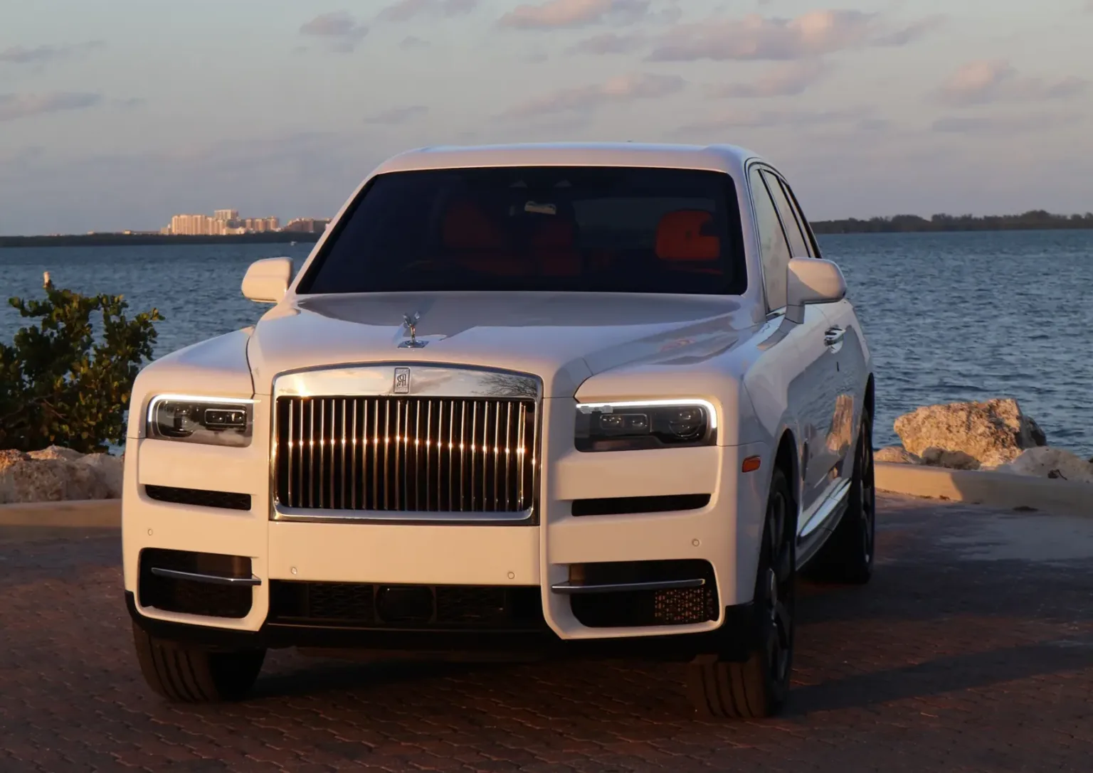 Rolls-Royce Cullinan — Starlight White on Orange