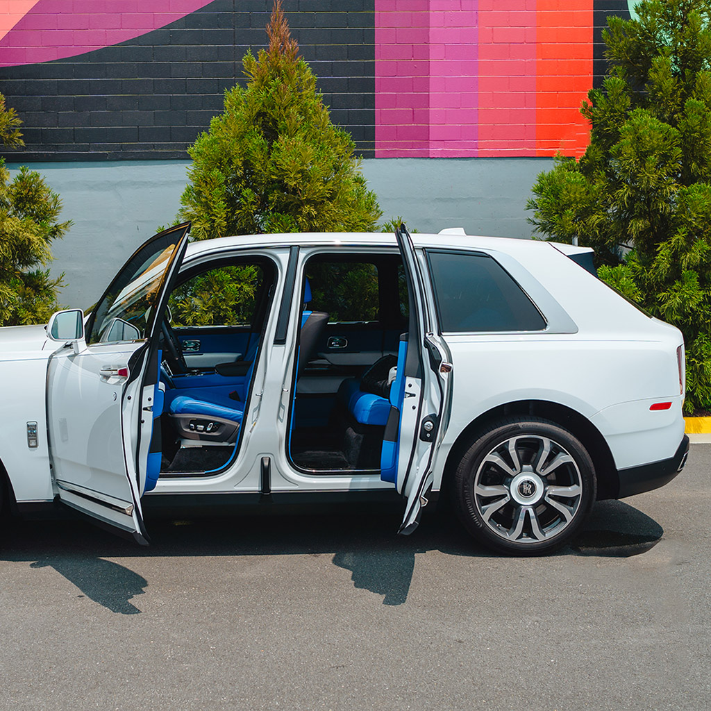 Rolls-Royce Cullinan — Arctic White on Charles Blue & Arctic White