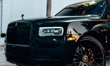 Rolls-Royce Cullinan Black Badge — Black on Orange