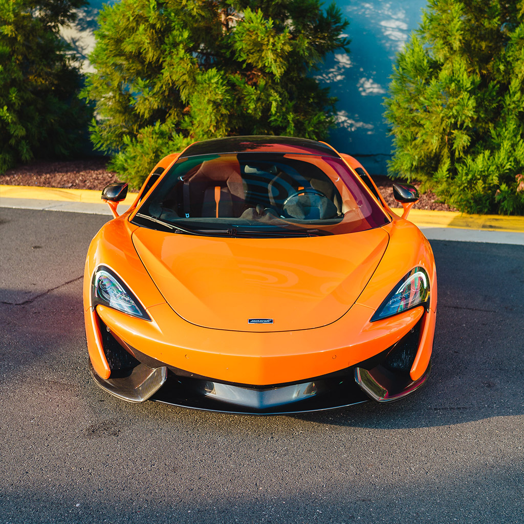 McLaren 570S — Ventura Orange on Carbon Black