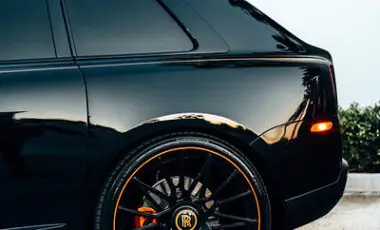 Rolls-Royce Cullinan Black Badge — Black on Orange