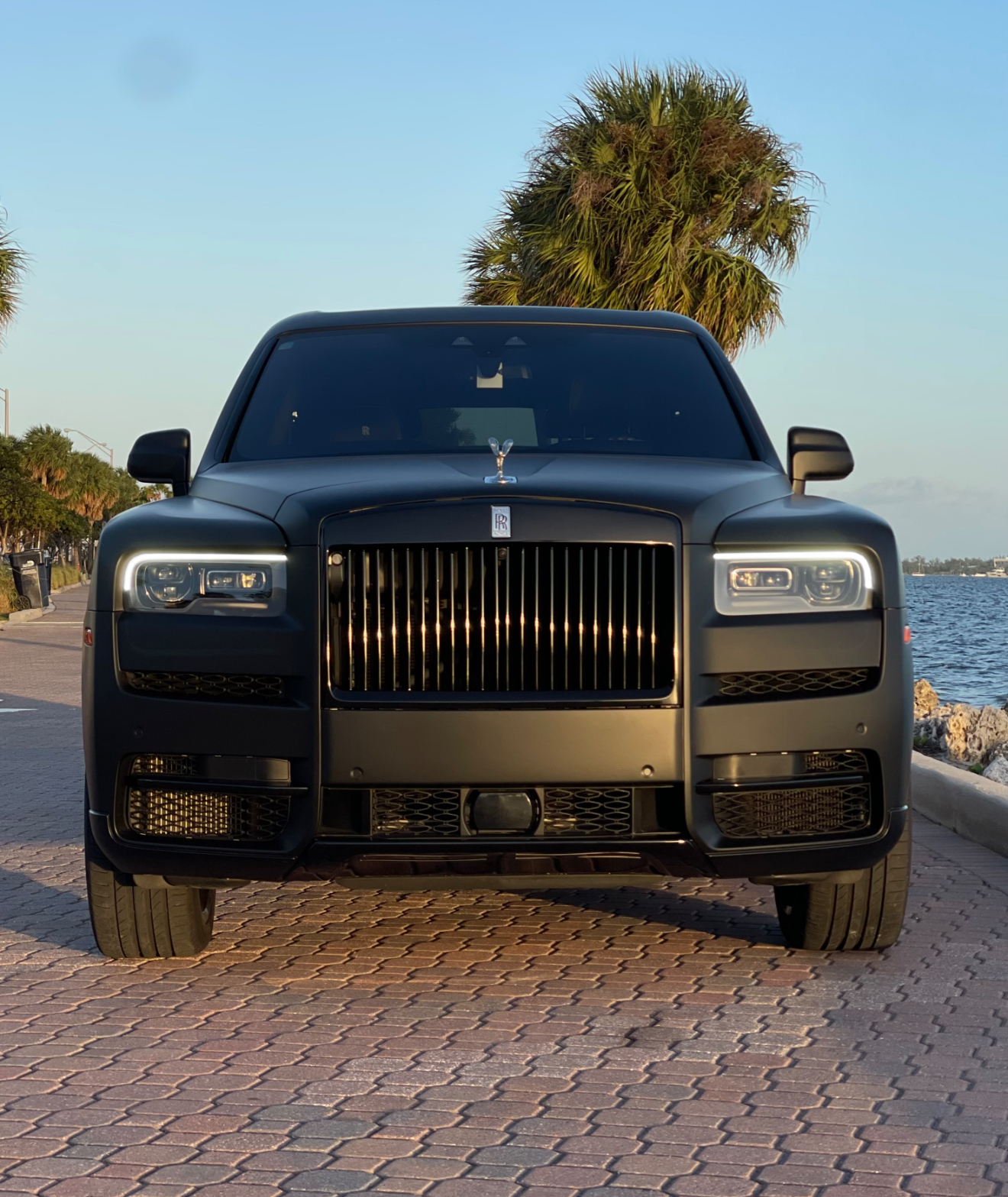 Chauffeur Service - Matte Black Roll Royce Cullinan