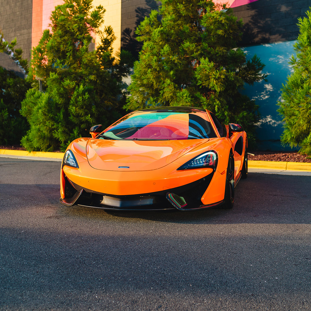 McLaren 570S — Ventura Orange on Carbon Black