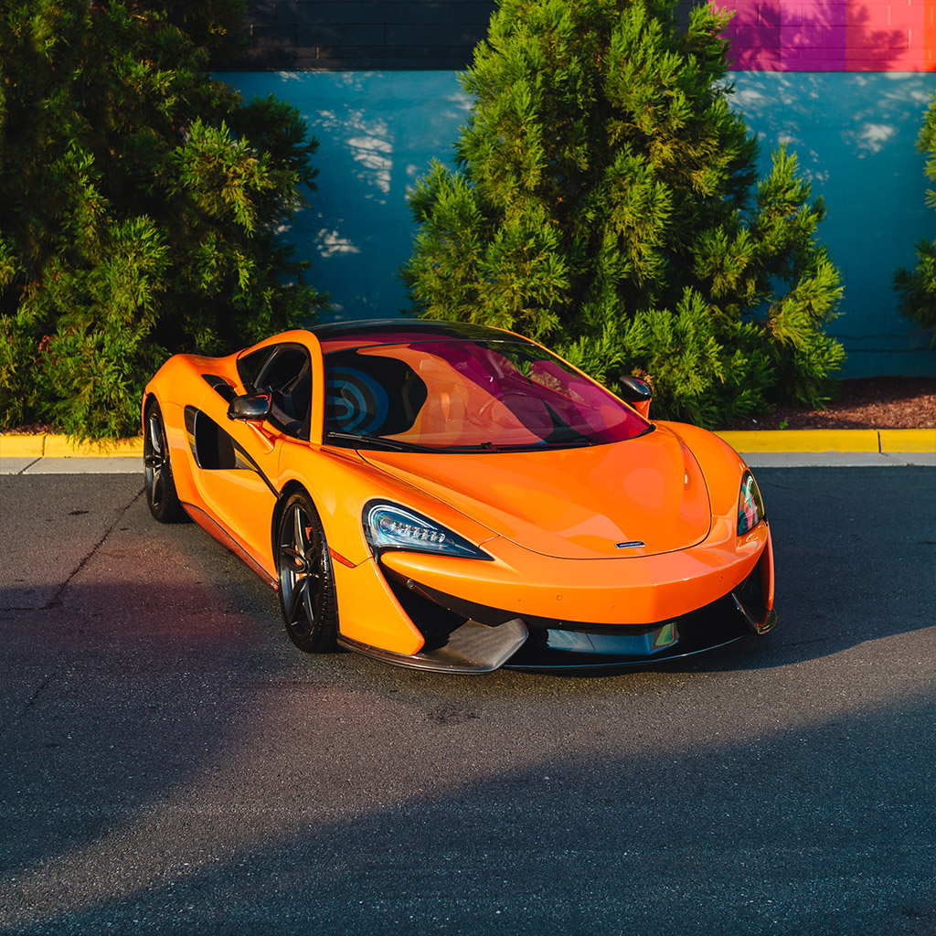 McLaren 570S — Ventura Orange on Carbon Black
