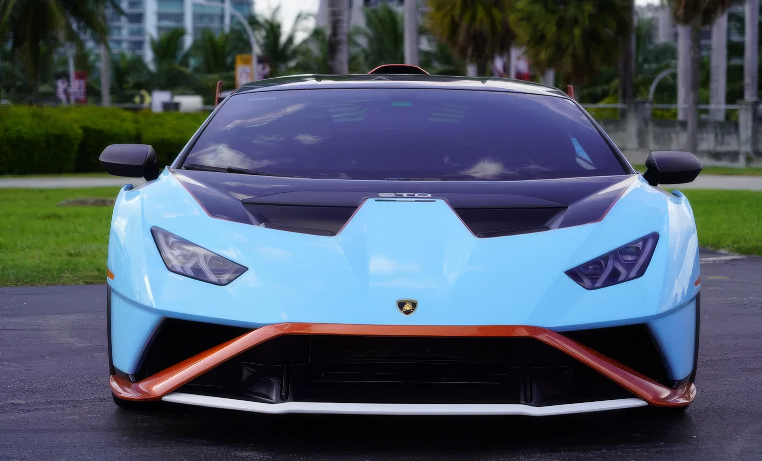 Lamborghini Huracán STO — Blu Laufey on Nero & Arancio (Light Sky Blue on Black & Orange)