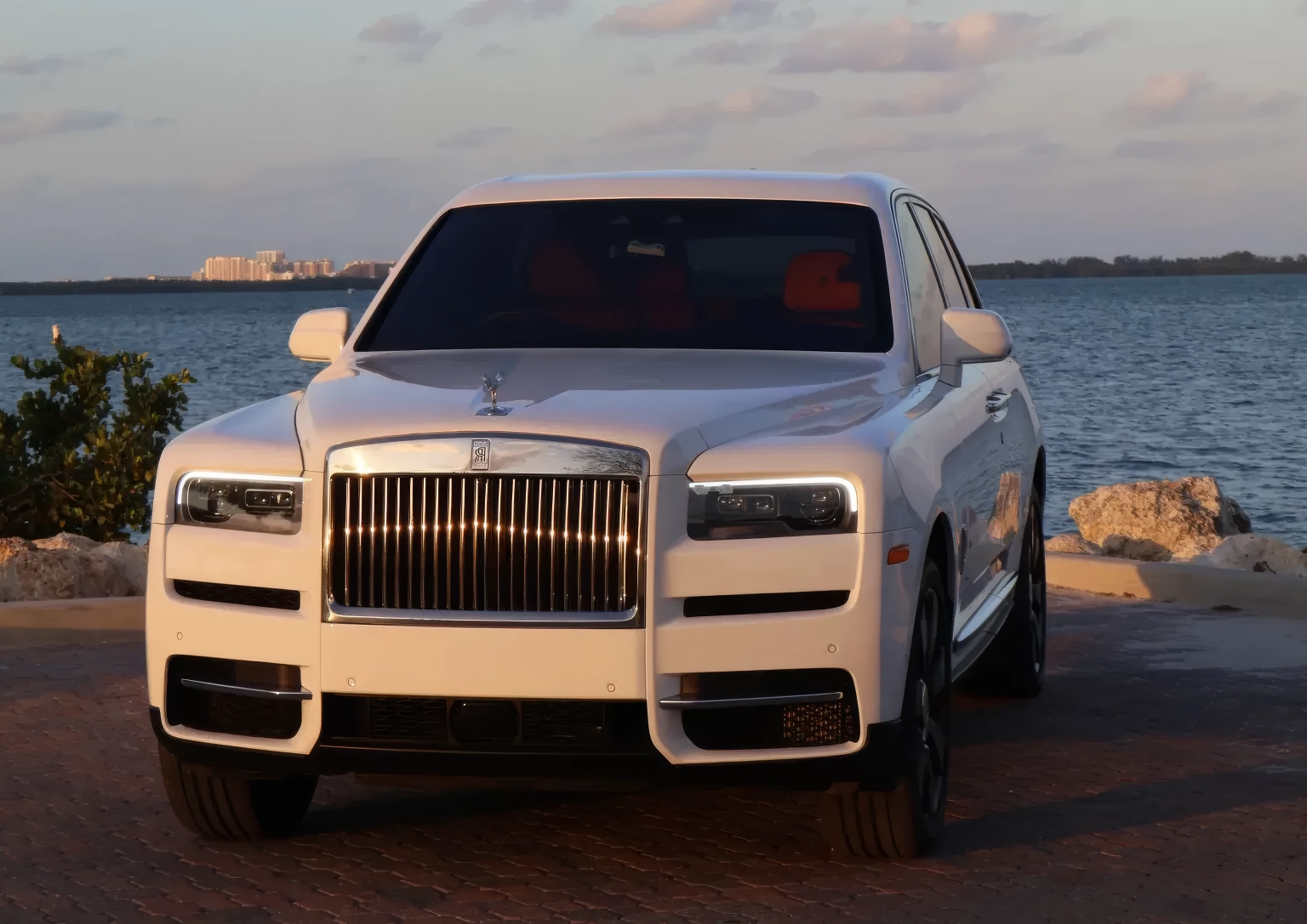 Rolls-Royce Cullinan — Arctic White on Mandarin & Black