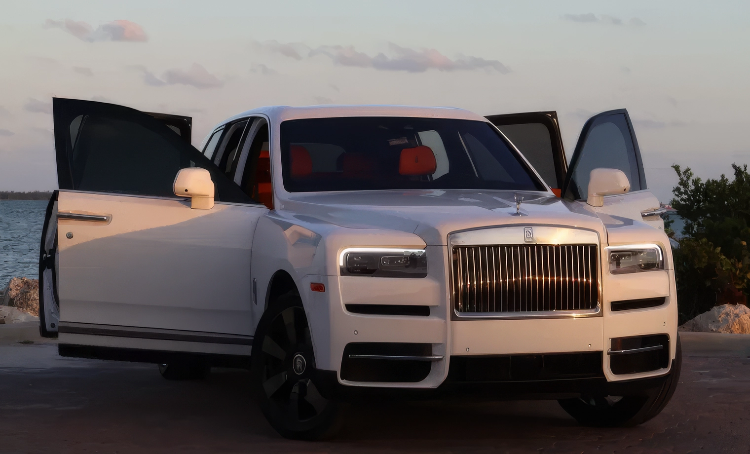 Rolls-Royce Cullinan — Arctic White on Mandarin & Black