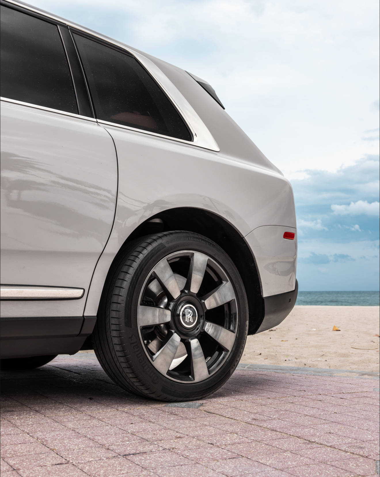 Chauffeur Service - Silver on Mandarin Rolls Royce Cullinan