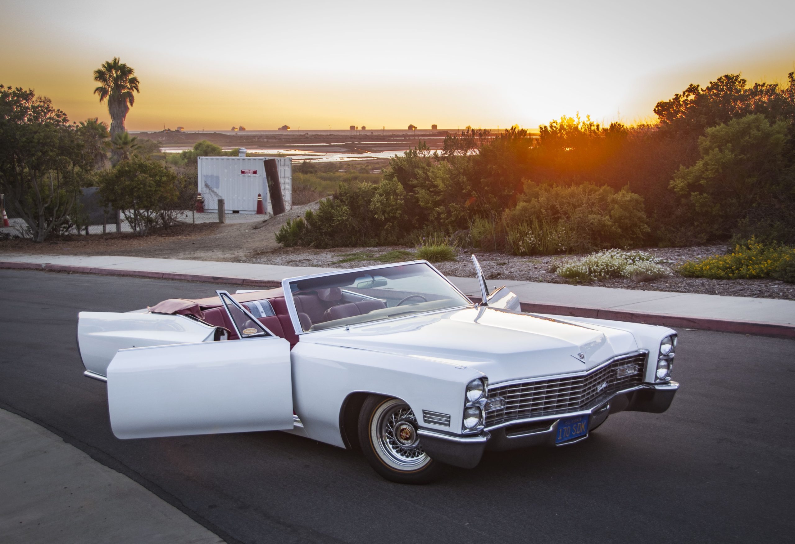 1965 Cadillac Coupe Deville - Classic White on Deep Burgundy