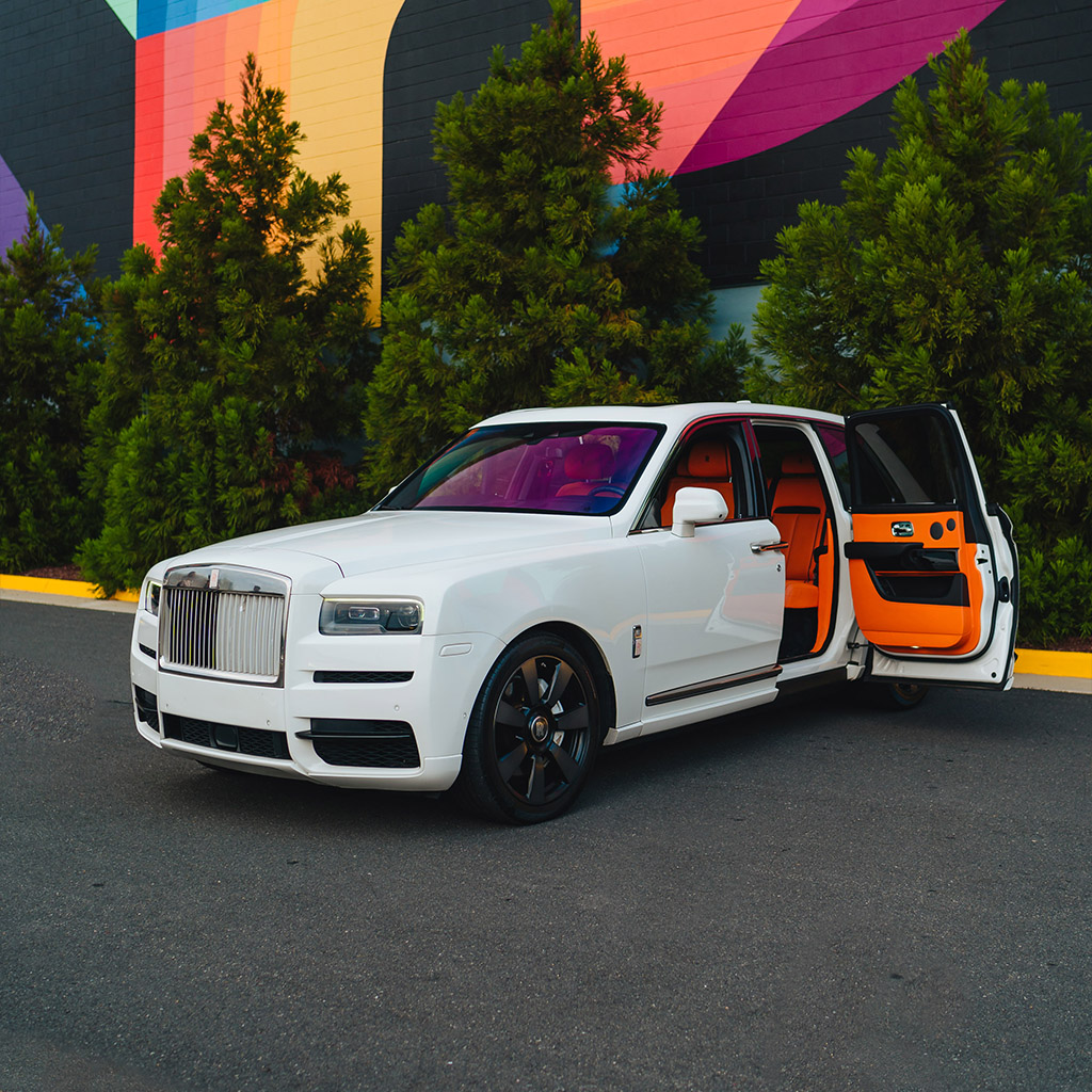 Rolls-Royce Cullinan — Arctic White on Mandarin & Black