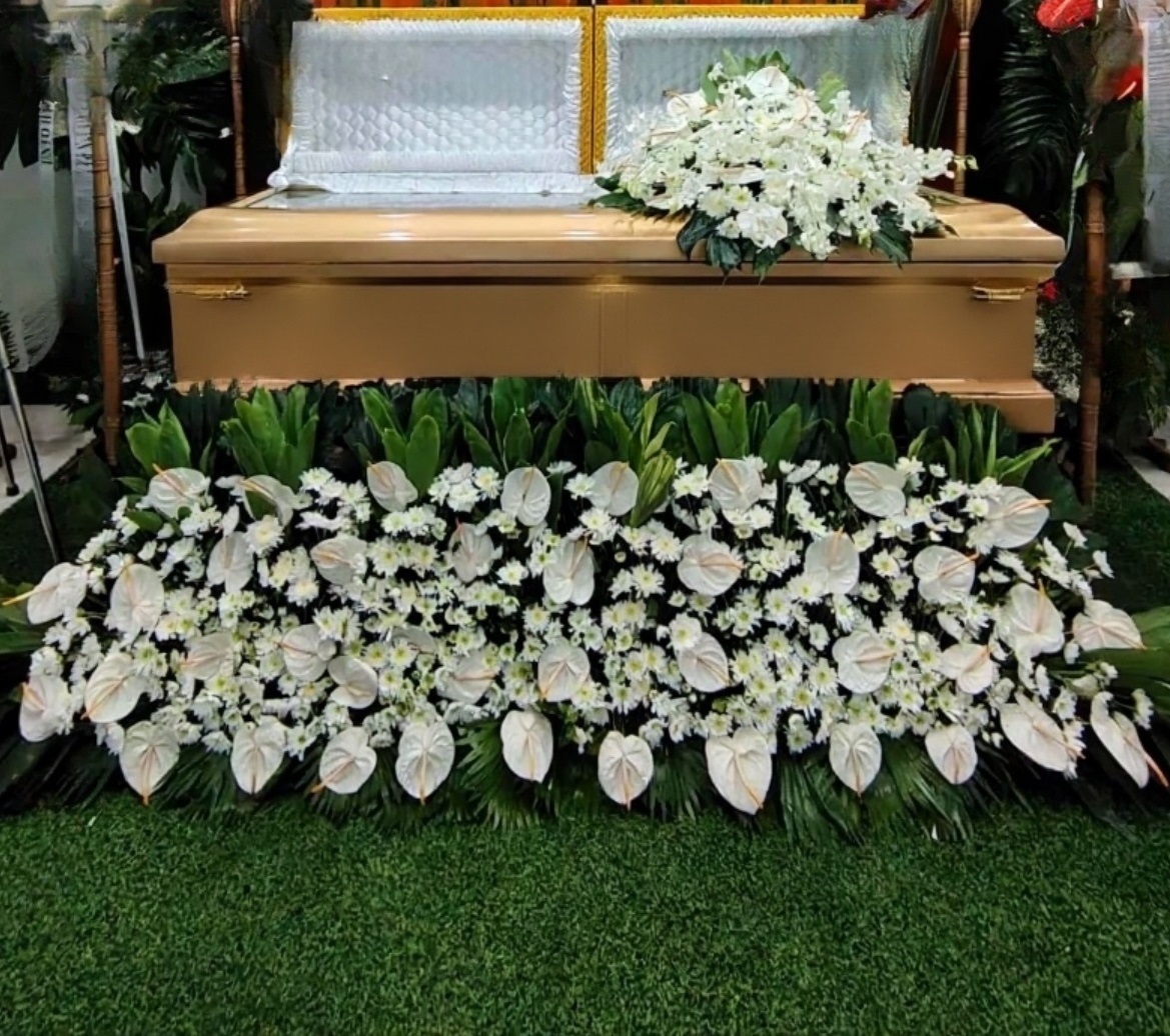 white casket flowers & floor Garden