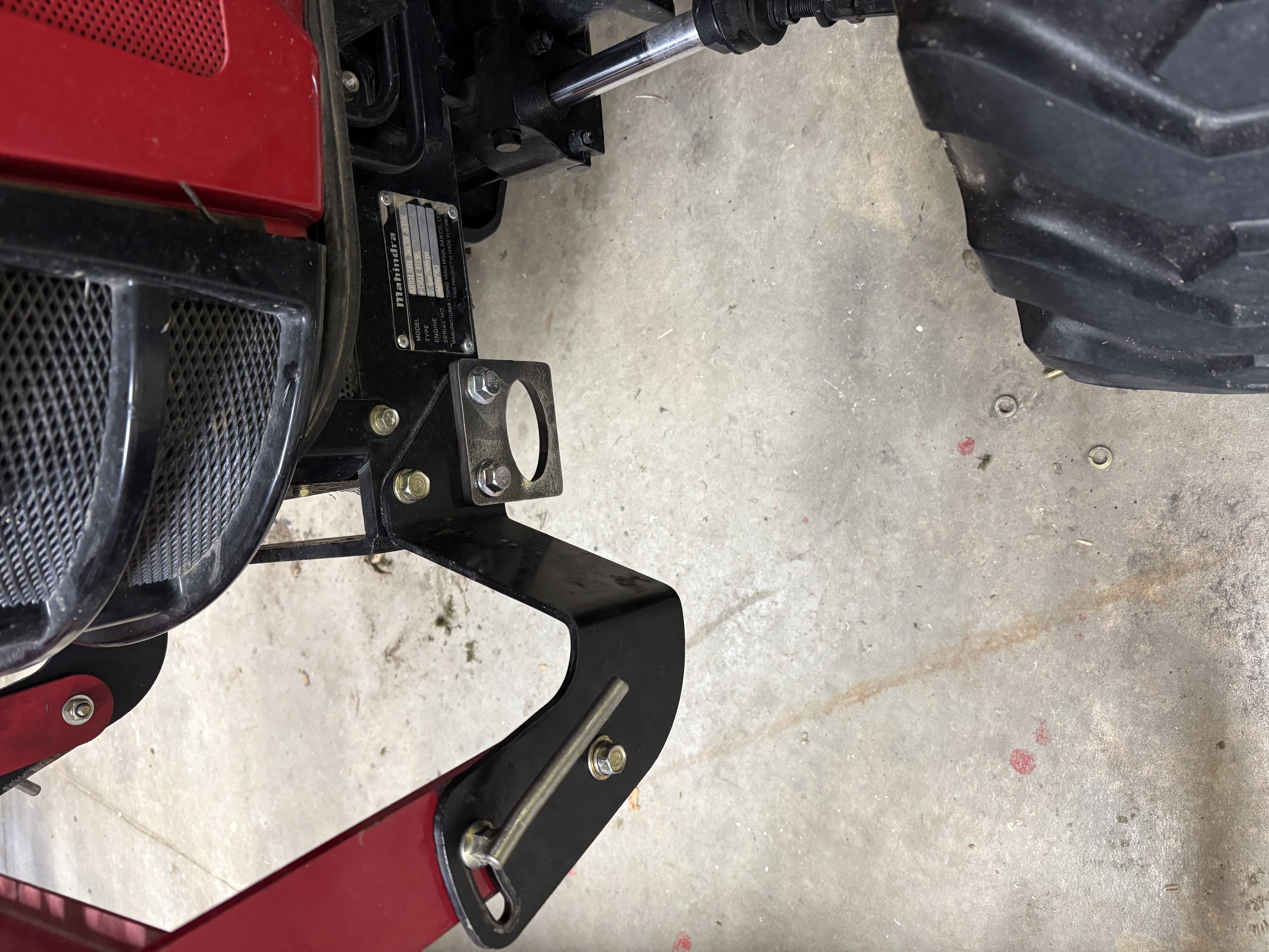 Bolt-on front tie down points