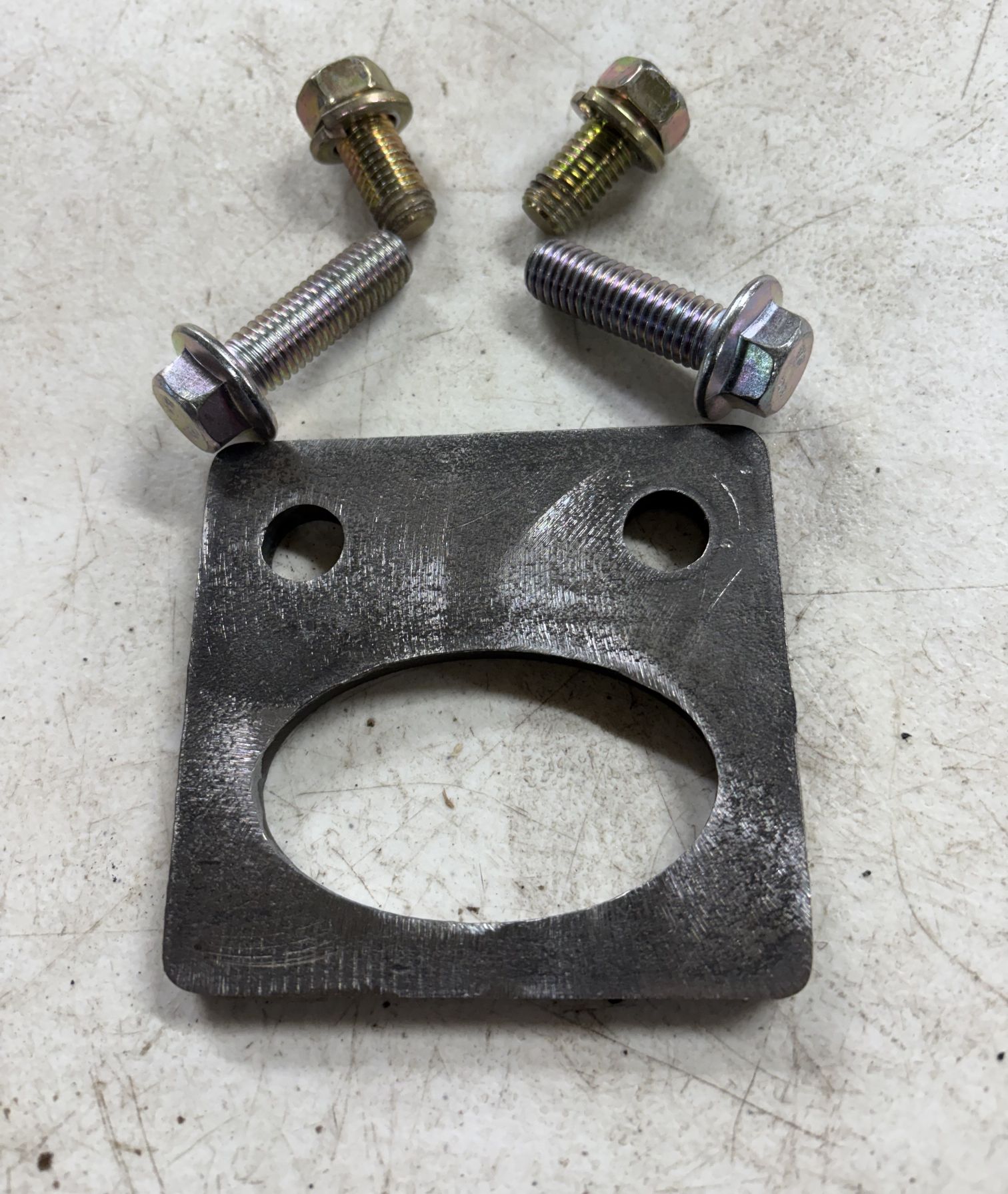 Bolt-on front tie down points