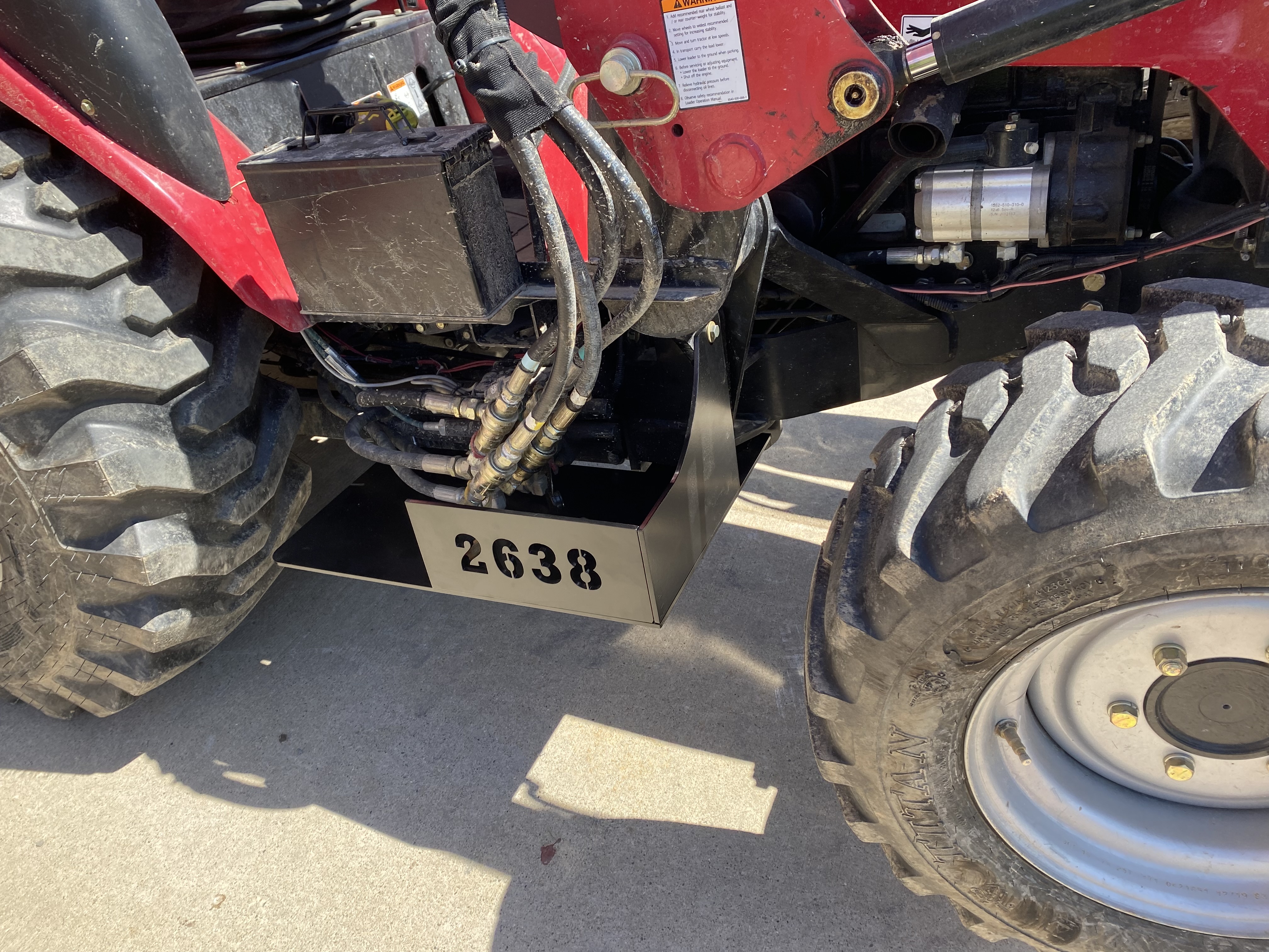 Hydraulic valve skid plate for Mahindra 2638 tractor